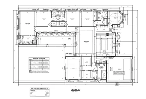 a black and white photo of a living room