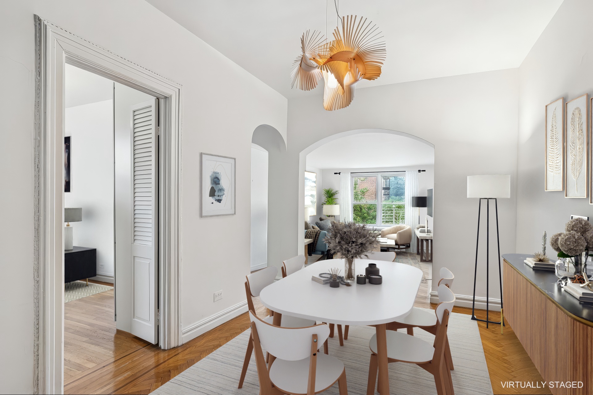 91 Payson Avenue, Unit 4D Manhattan, NY 10034 - Photo 6 of 24 a view of a dining room with furniture window and wooden floor
