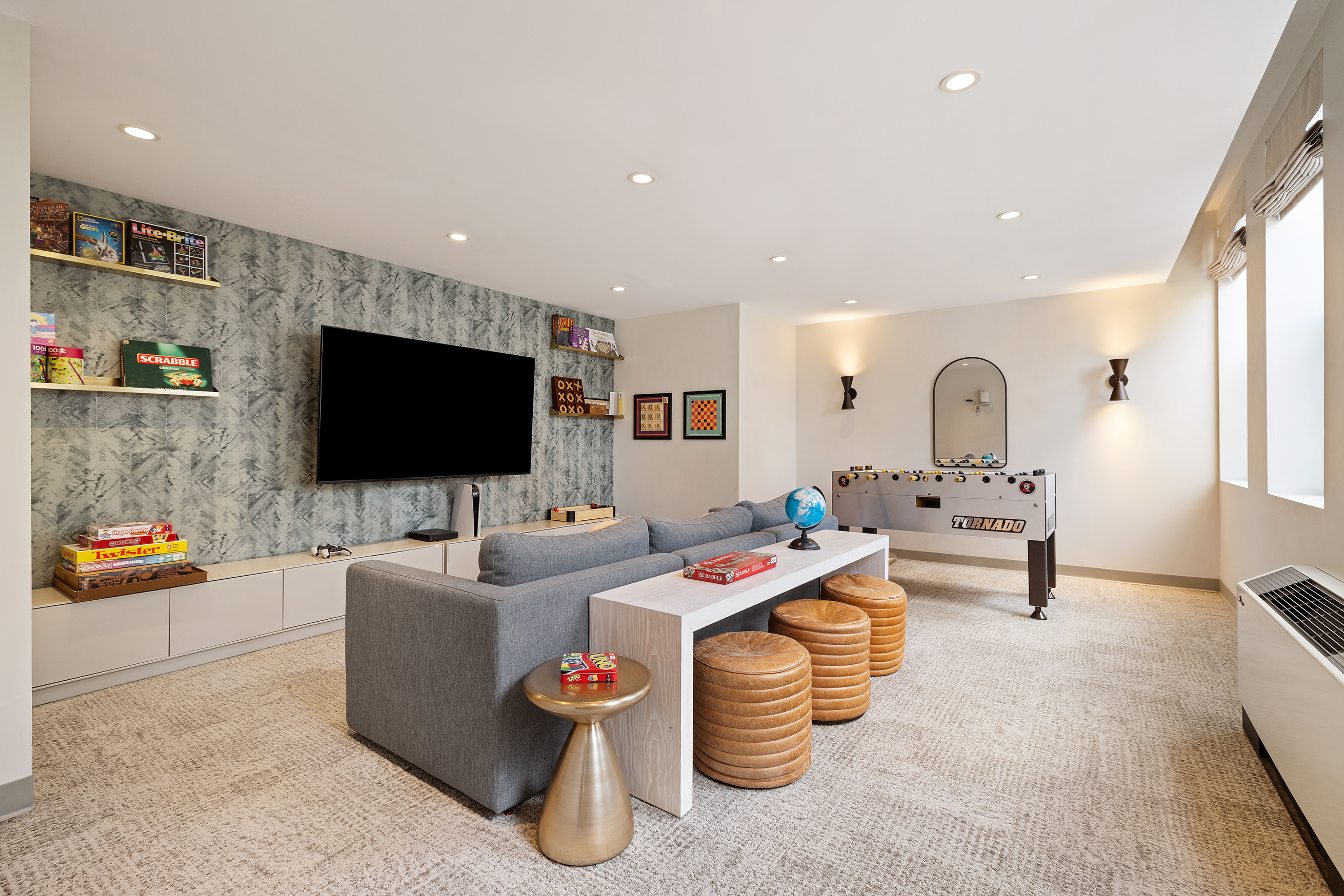 80 Chambers Street, Unit 11A Manhattan, NY 10007 - Photo 15 of 24 a living room with furniture and a flat screen tv