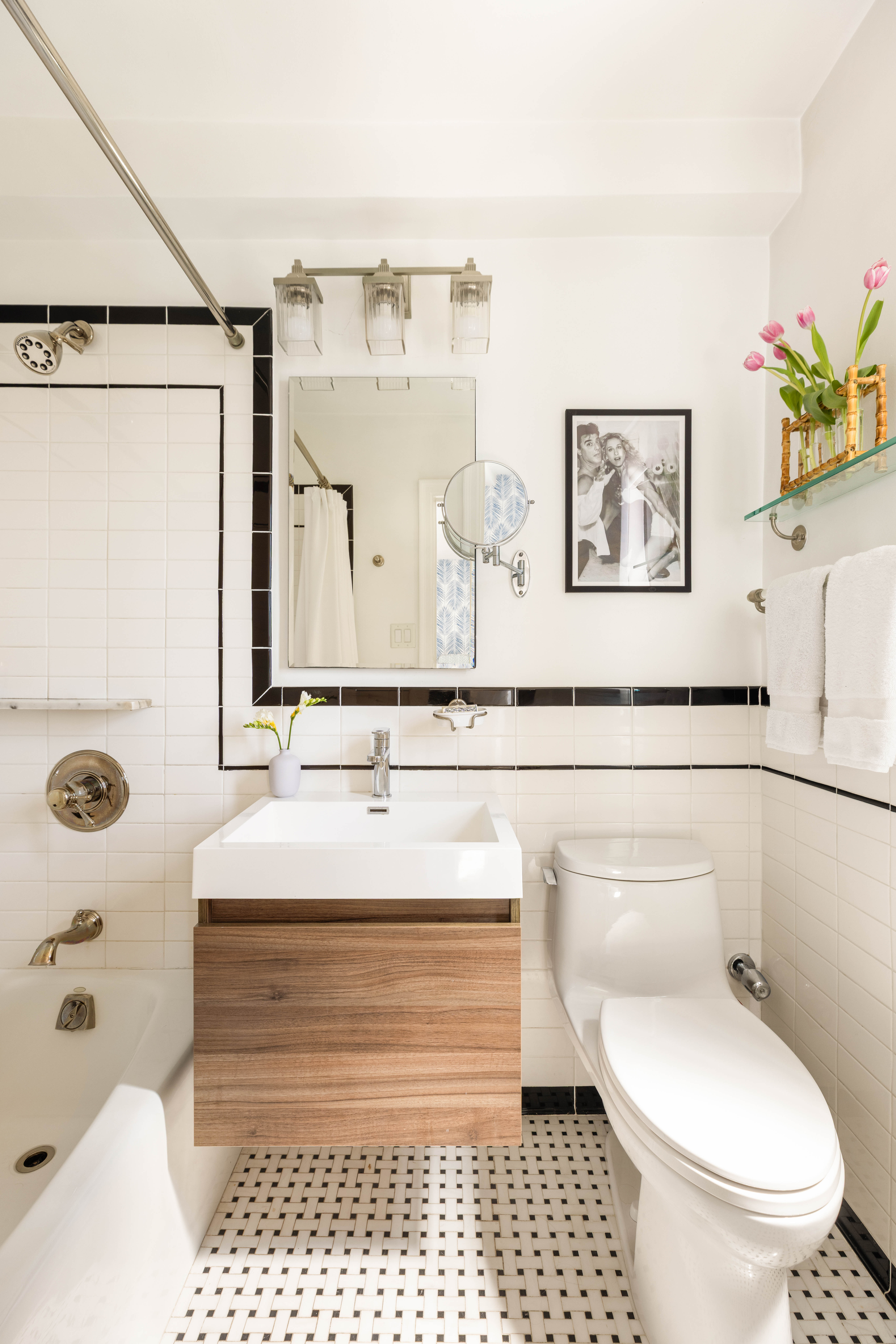 200 East 16th Street, Unit 14C Manhattan, NY 10003 - Photo 12 of 14 a bathroom with a sink a toilet and shower