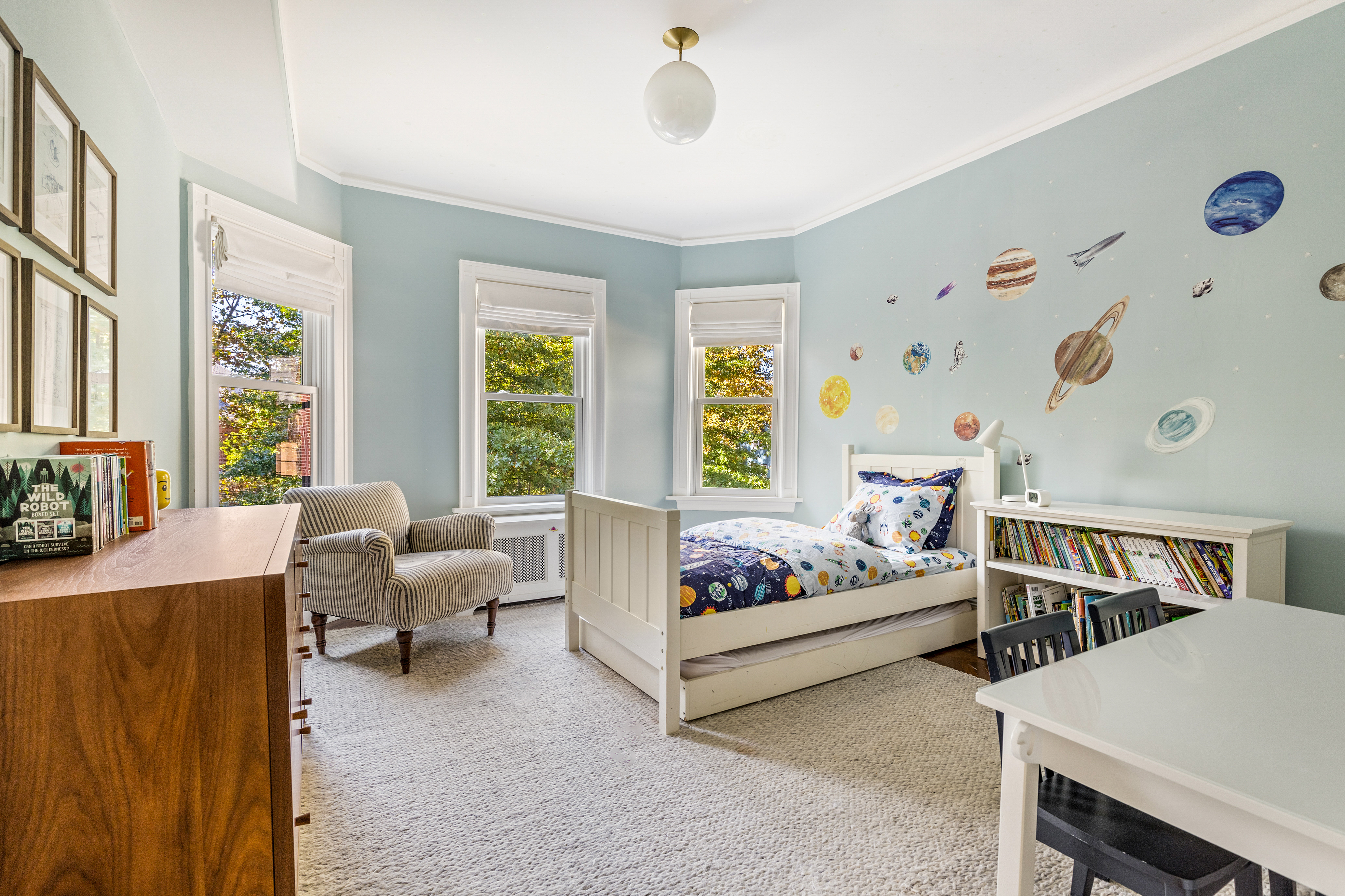 689 East 17th Street Brooklyn, NY 11230 - Photo 19 of 28 a bedroom with furniture and a large window