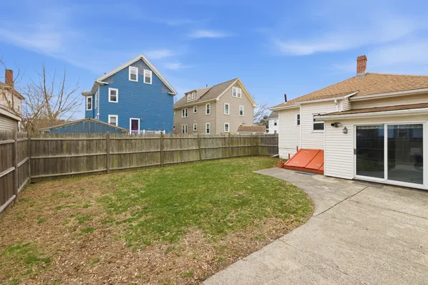 a view of backyard with green space