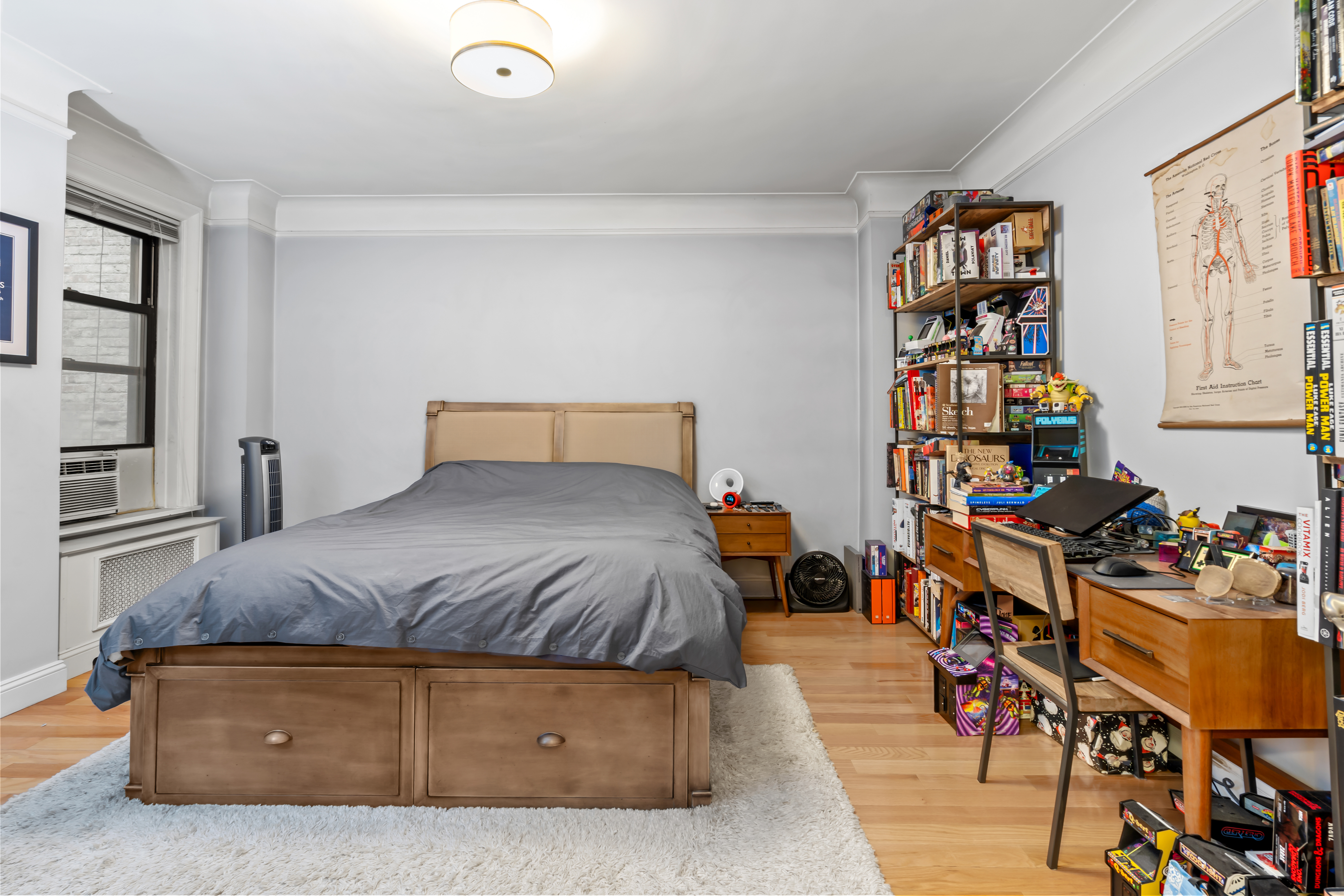 467 Central Park West, Unit 2G Manhattan, NY 10025 - Photo 7 of 10 a bedroom with furniture and natural light