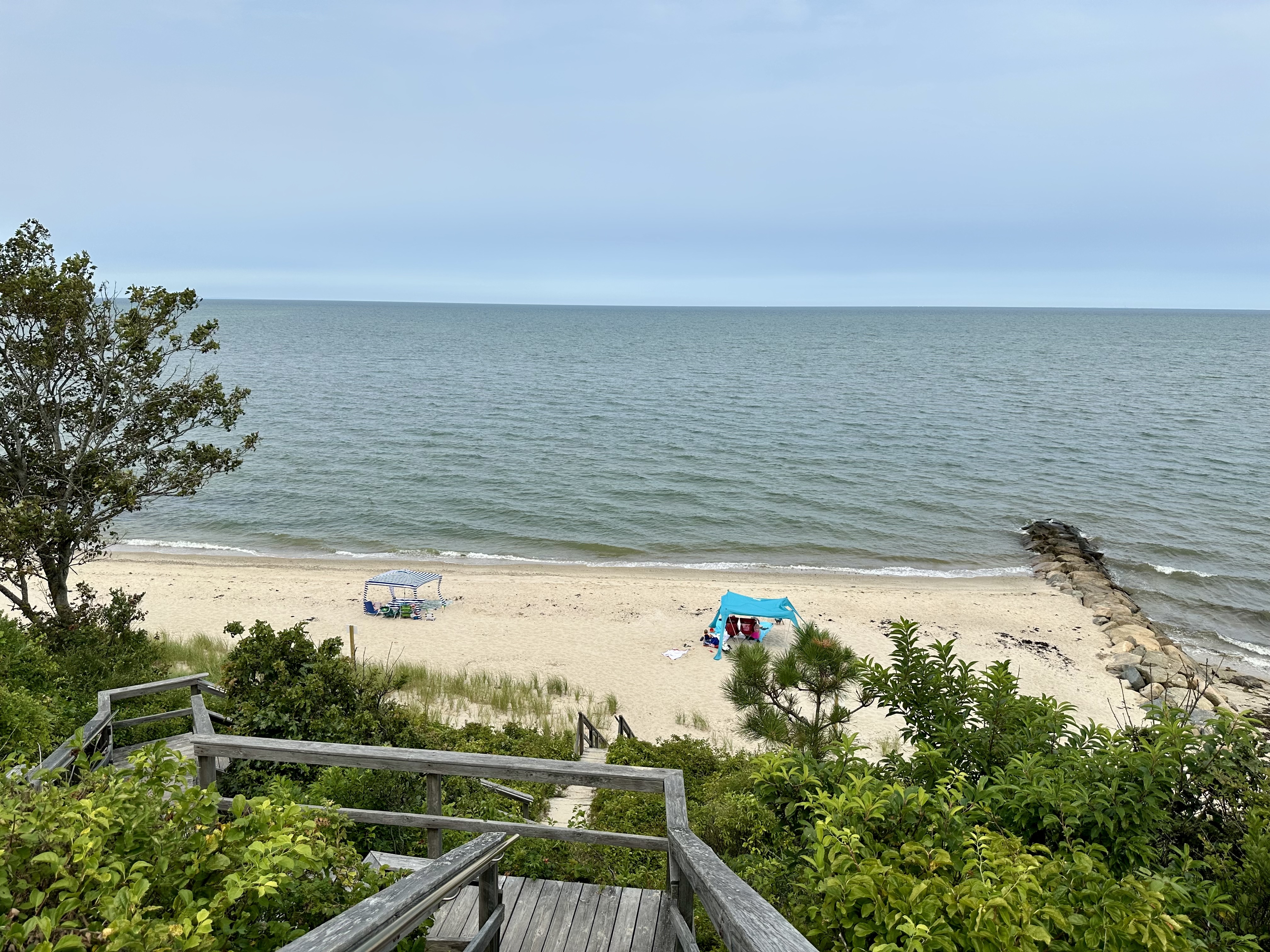 11 Juniper Circle Brewster, MA 02631 - Photo 22 of 29 a view of a lake from a balcony
