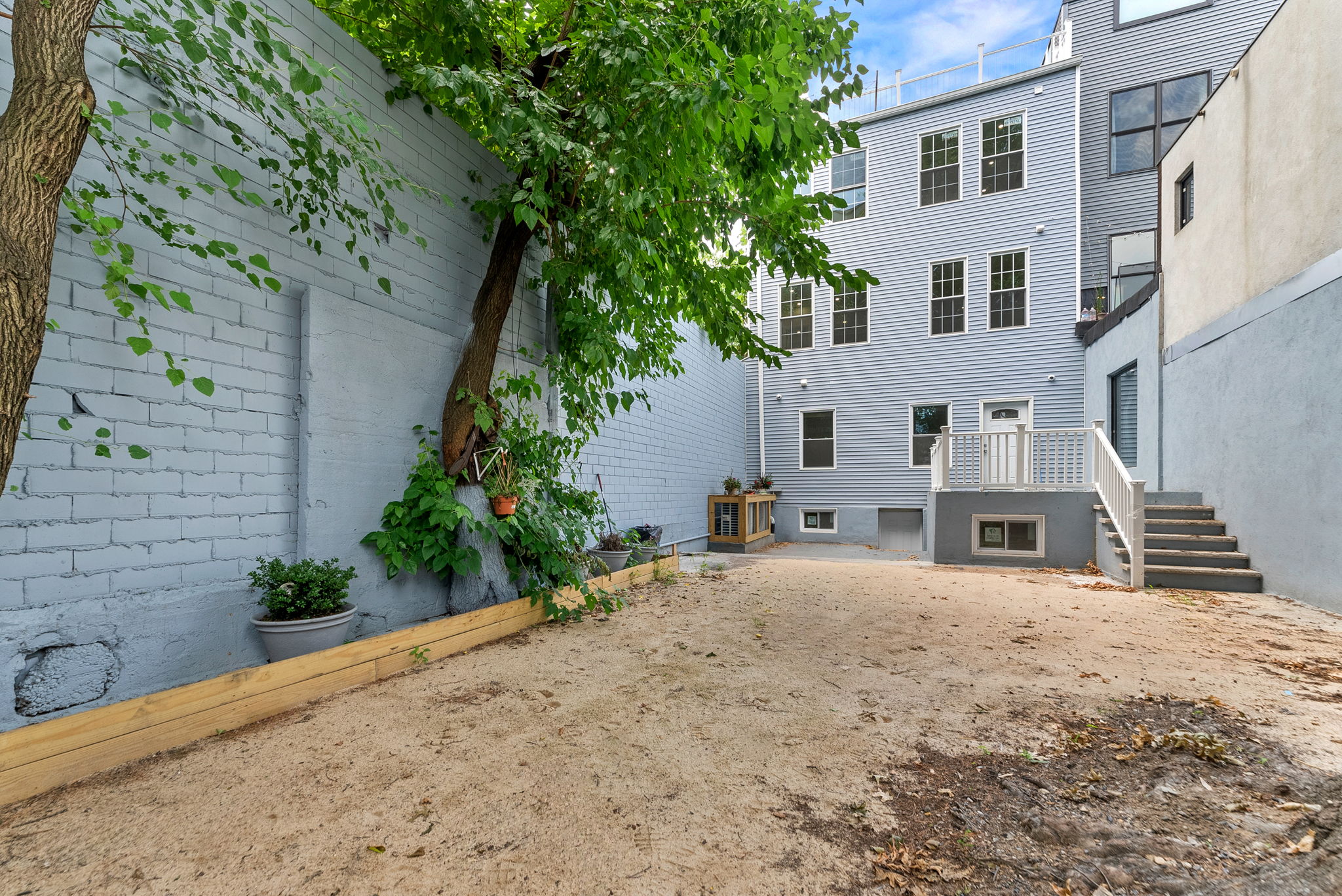 217 Butler Street, Unit 1 Brooklyn, NY 11217 - Photo 7 of 10 a view of a house with a patio