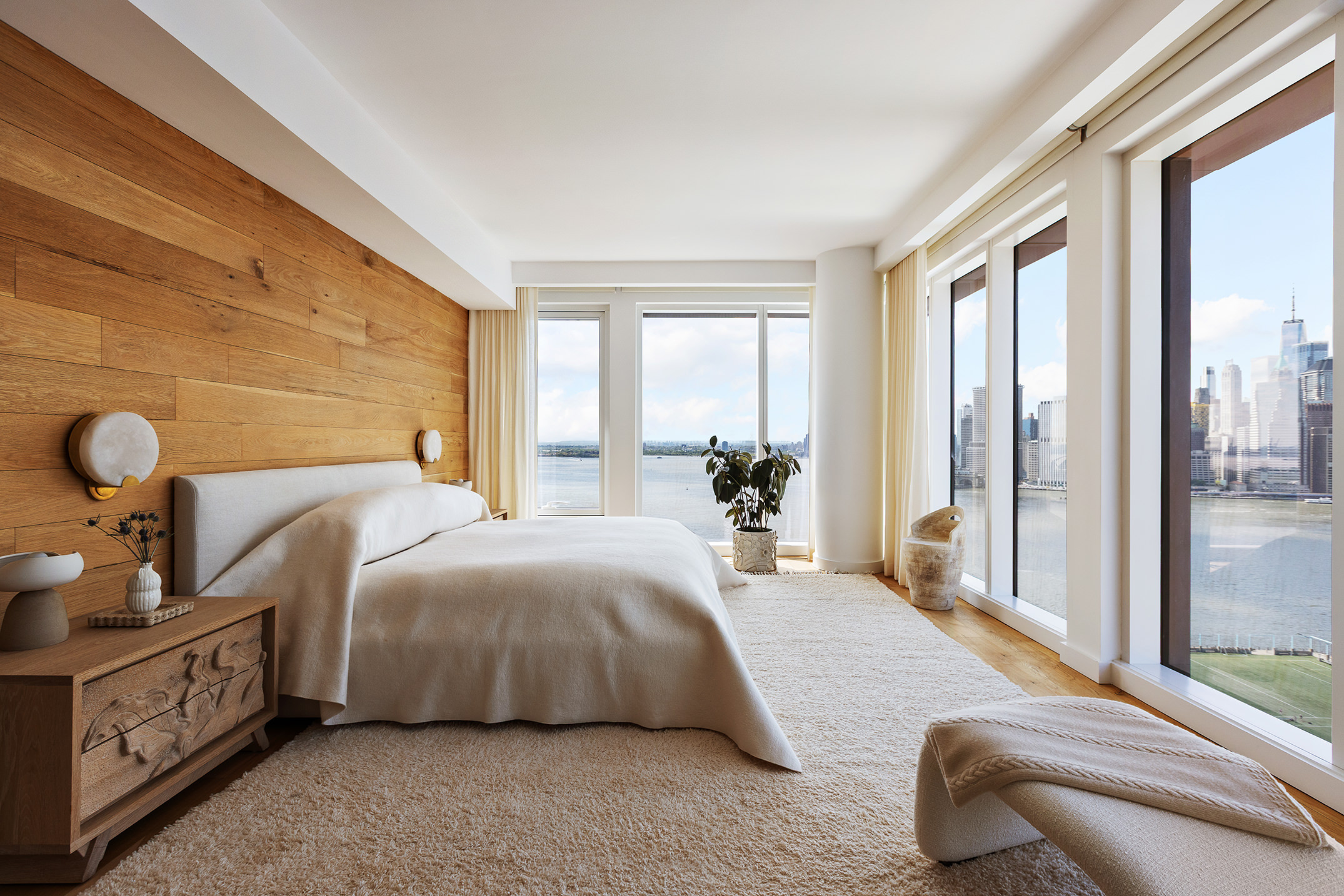 50 Bridge Park Drive, Unit 26A Brooklyn, NY 11201 - Photo 14 of 29 a bedroom with a bed and large windows