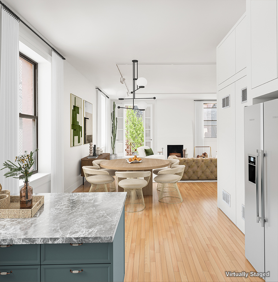 295 East 8th Street, Unit 2/3E Manhattan, NY 10009 - Photo 9 of 23 a view of a living room and dining room