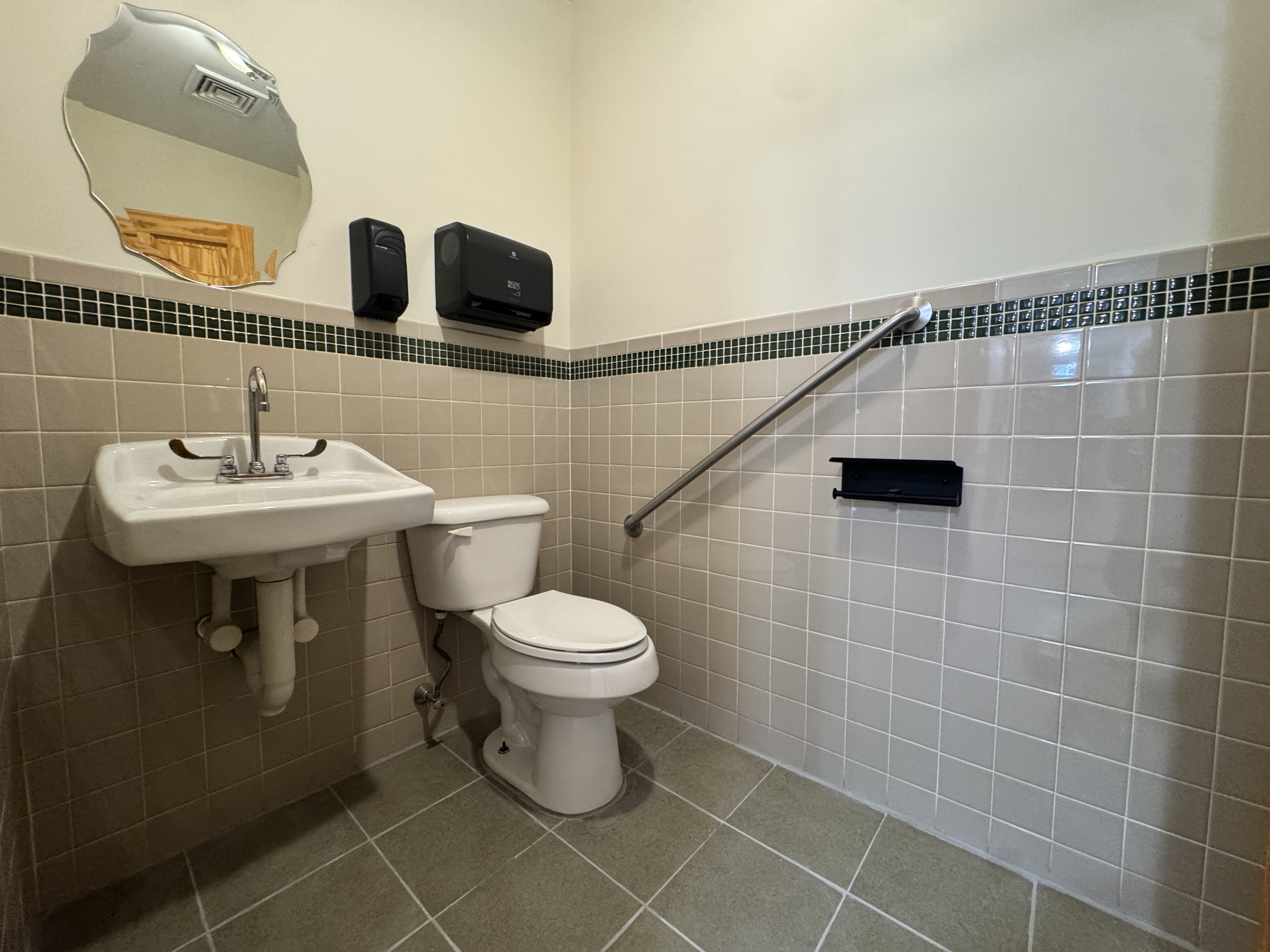 406 15th Street, Unit M1 Brooklyn, NY 11215 - Photo 8 of 19 a bathroom with a sink toilet and shower