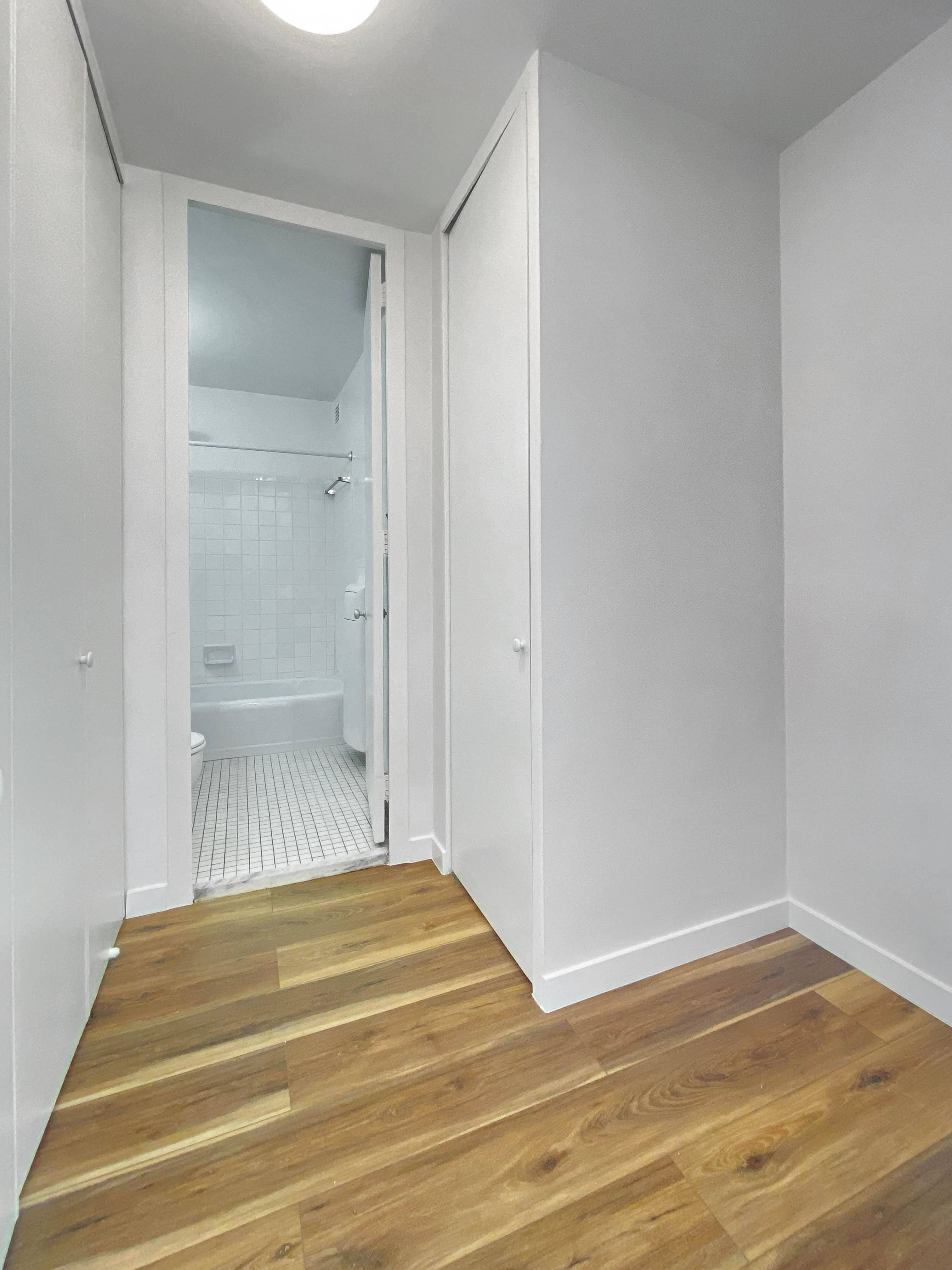 343 East 30th Street, Unit 4F Manhattan, NY 10016 - Photo 6 of 16 a view of a room with wooden floor