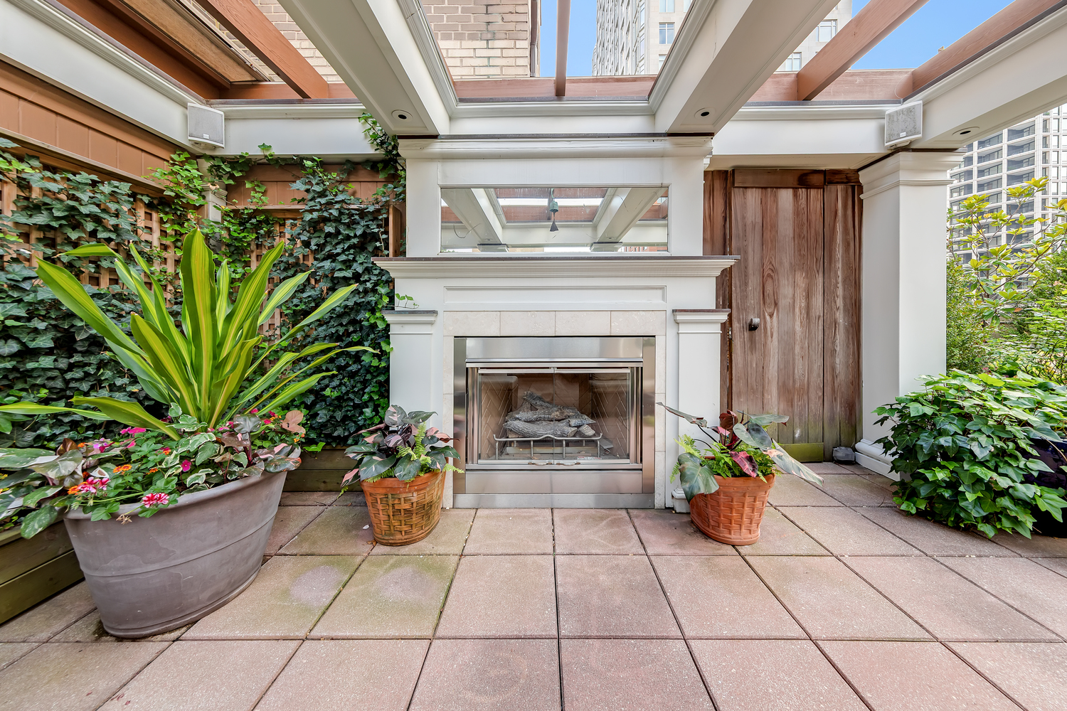25 Central Park West, Unit 21J Manhattan, NY 10023 - Photo 5 of 37 a potted plant sitting in front of a house