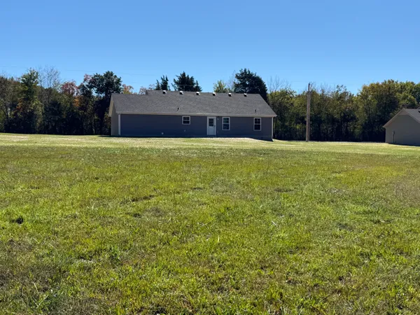 a view of outdoor space and yard
