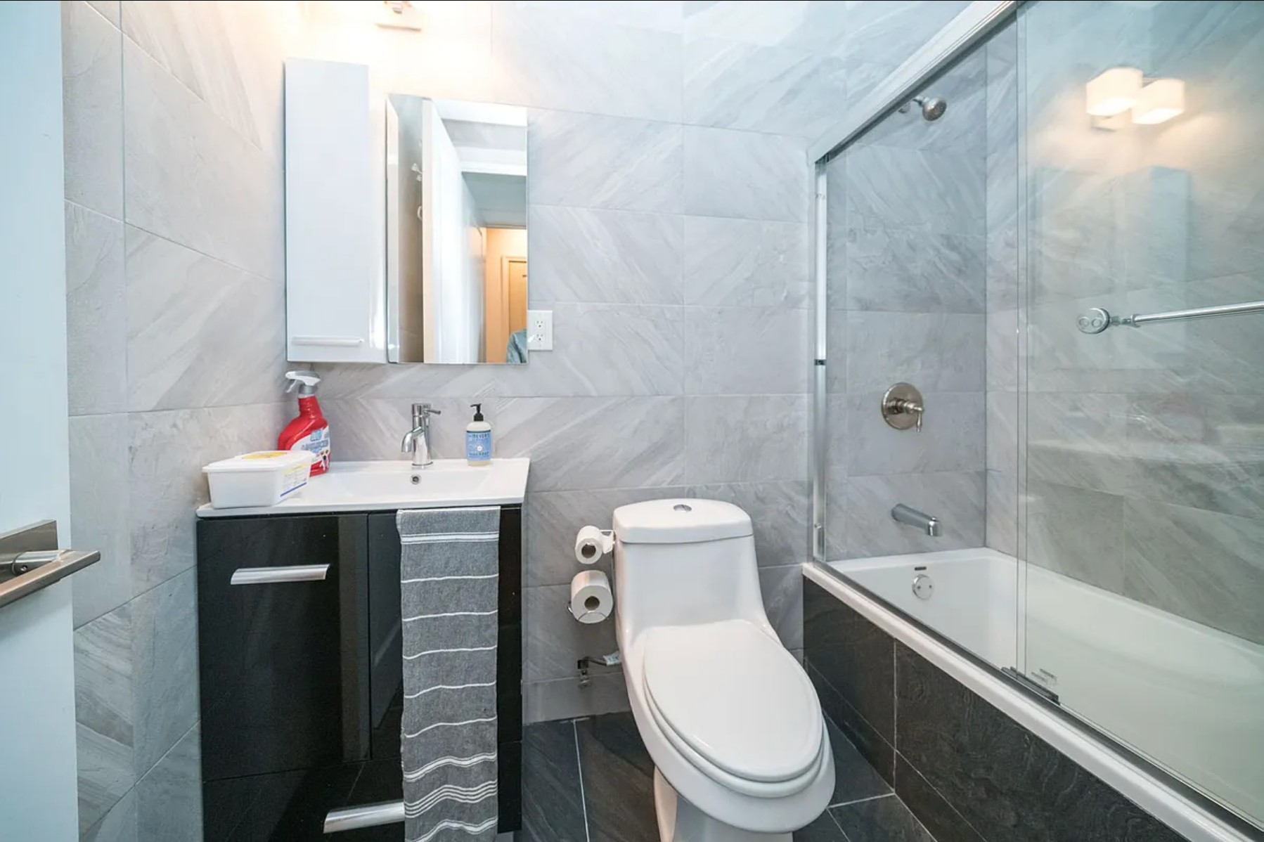 29 Melrose Street, Unit 2 Brooklyn, NY 11206 - Photo 5 of 13 a bathroom with a sink toilet and shower