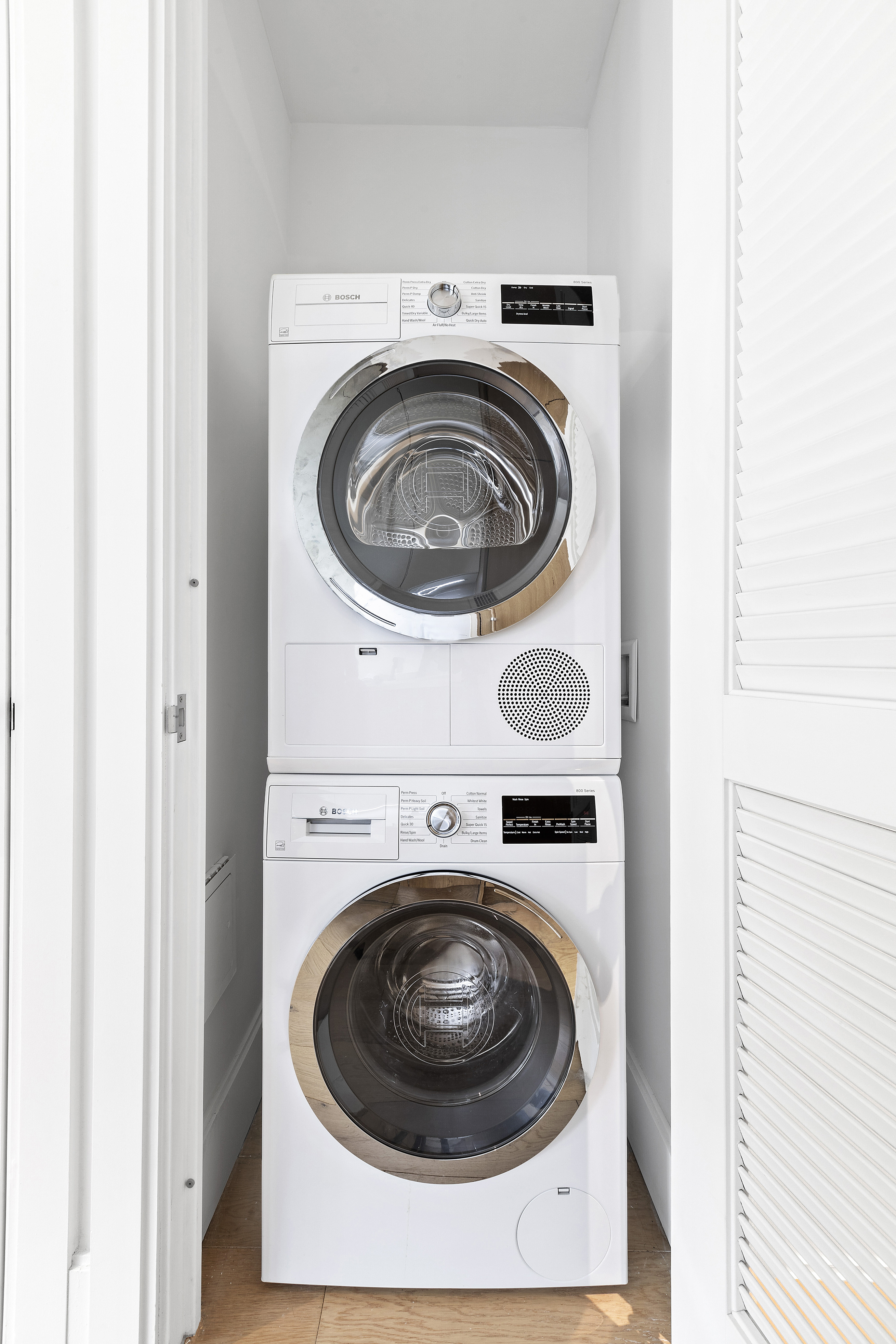 22-18 Jackson Avenue, Unit 209 Queens, NY 11101 - Photo 6 of 14 a utility room with dryer and washer