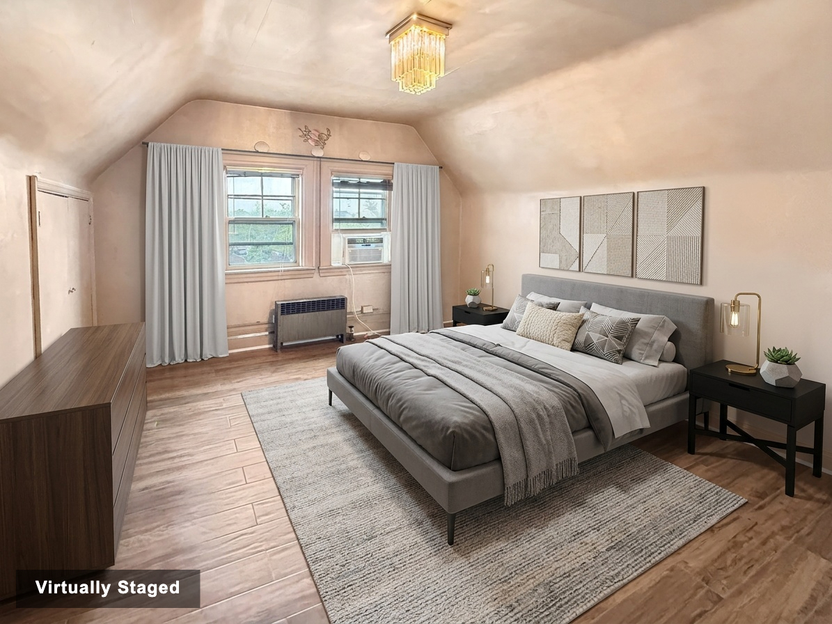3829 Beach 38th Street Brooklyn, NY 11224 - Photo 19 of 31 a bedroom with a large bed and a window