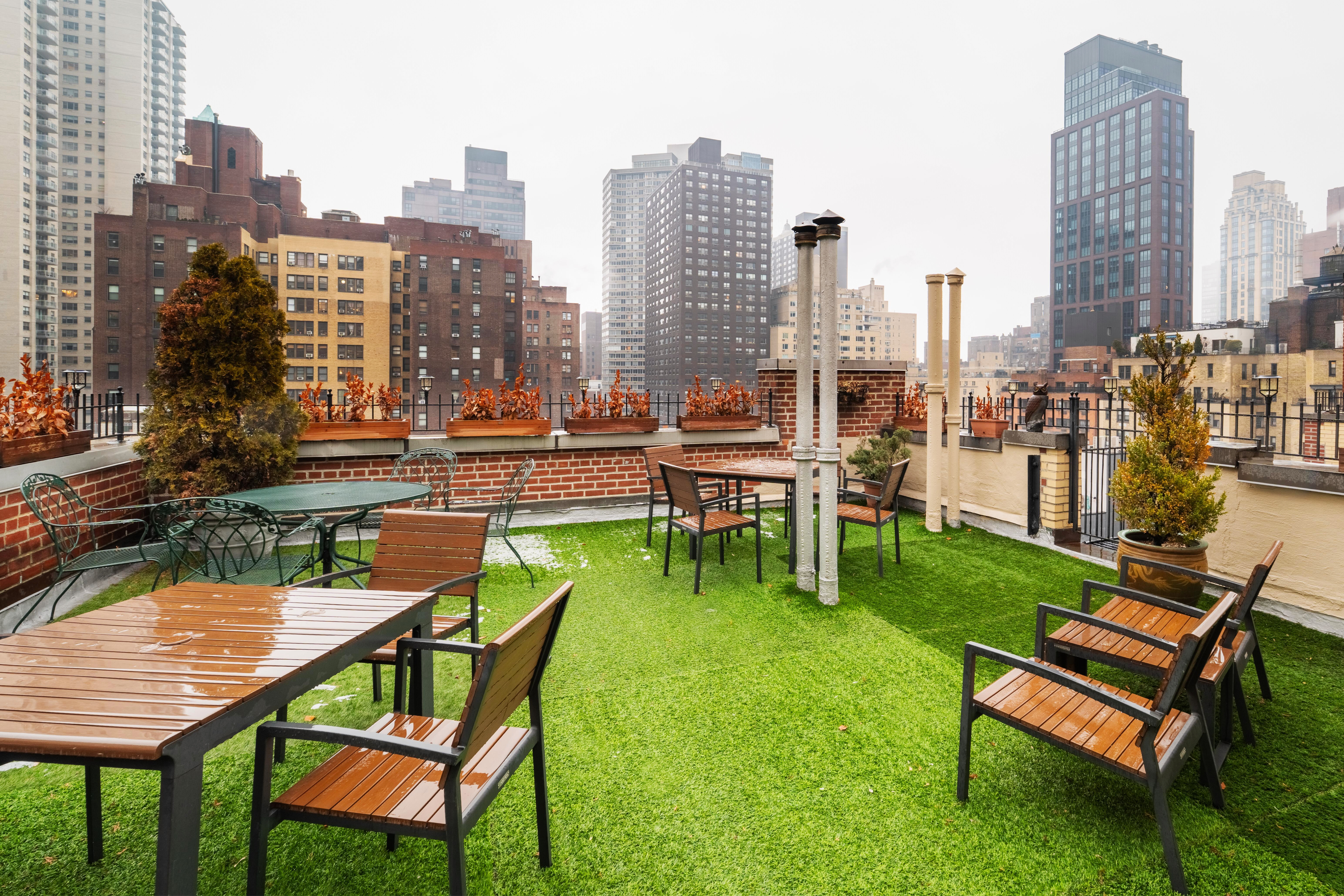 321 East 54th Street, Unit 3D Manhattan, NY 10022 - Photo 5 of 7 a view of a chairs in a patio