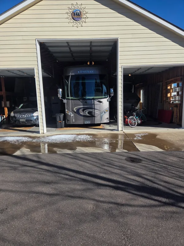 a view of a refrigerator and car parked