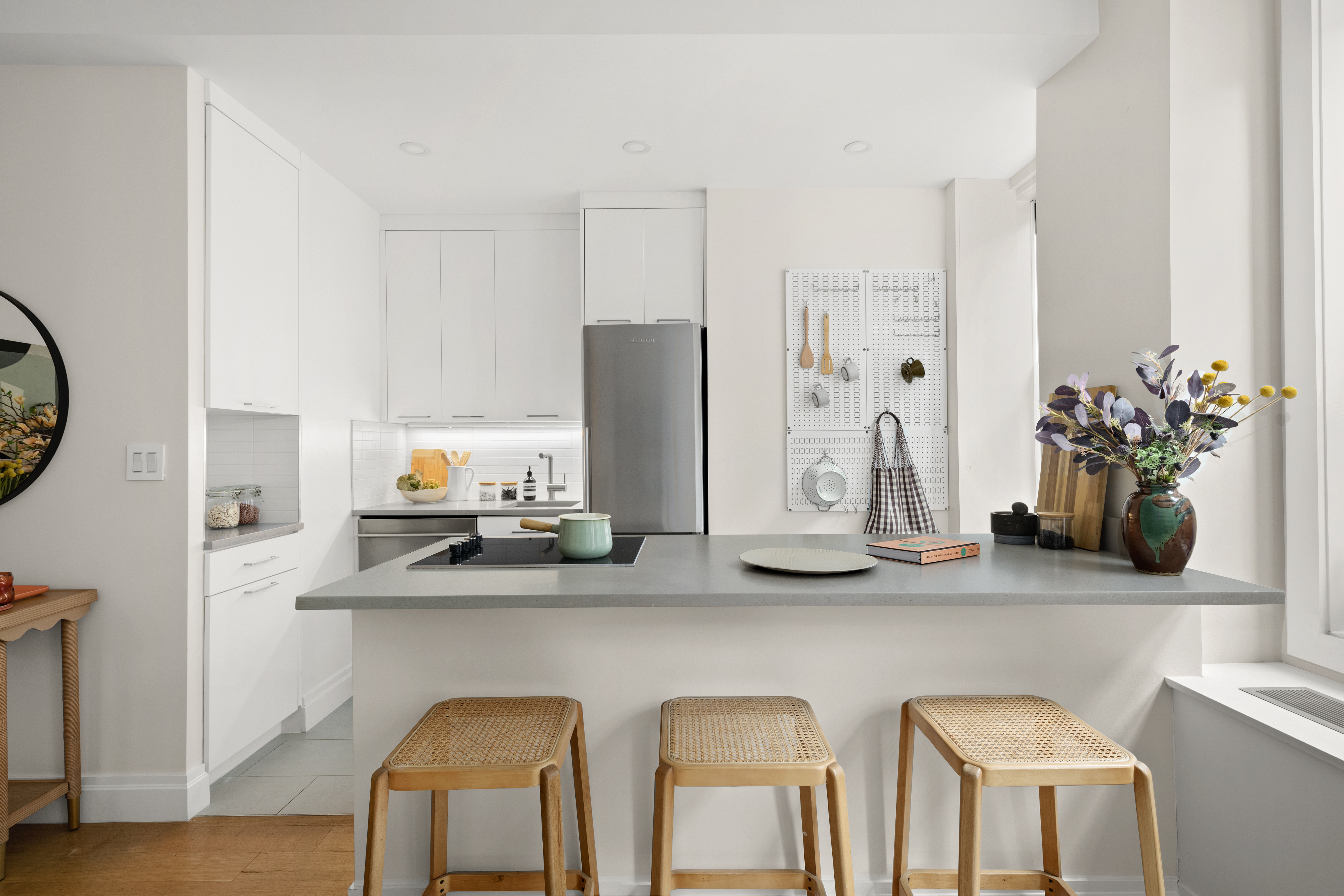 41 5th Avenue, Unit 8CN Manhattan, NY 10003 - Photo 5 of 11 a view of kitchen island with furniture and wooden floor