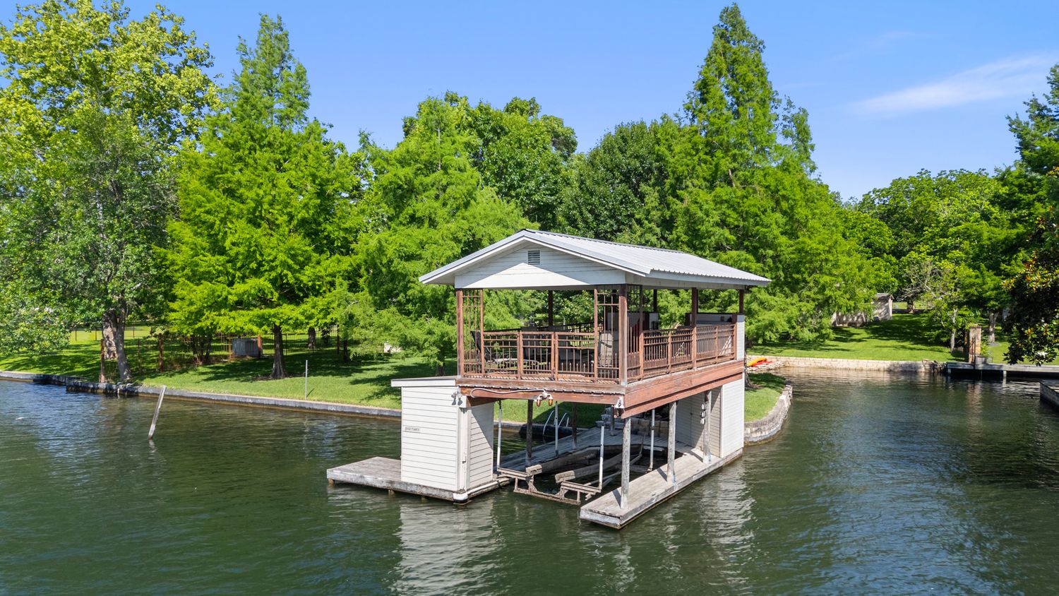 a house with river in front of it