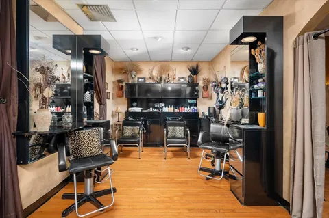 a room with lots of chairs and gym equipment