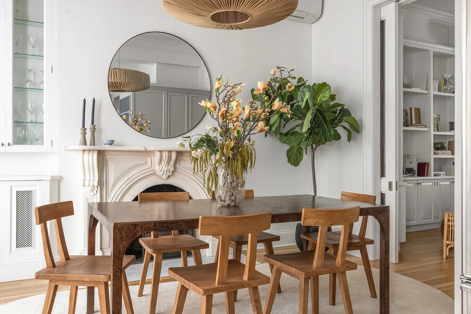 a view of a chair and table in the balcony