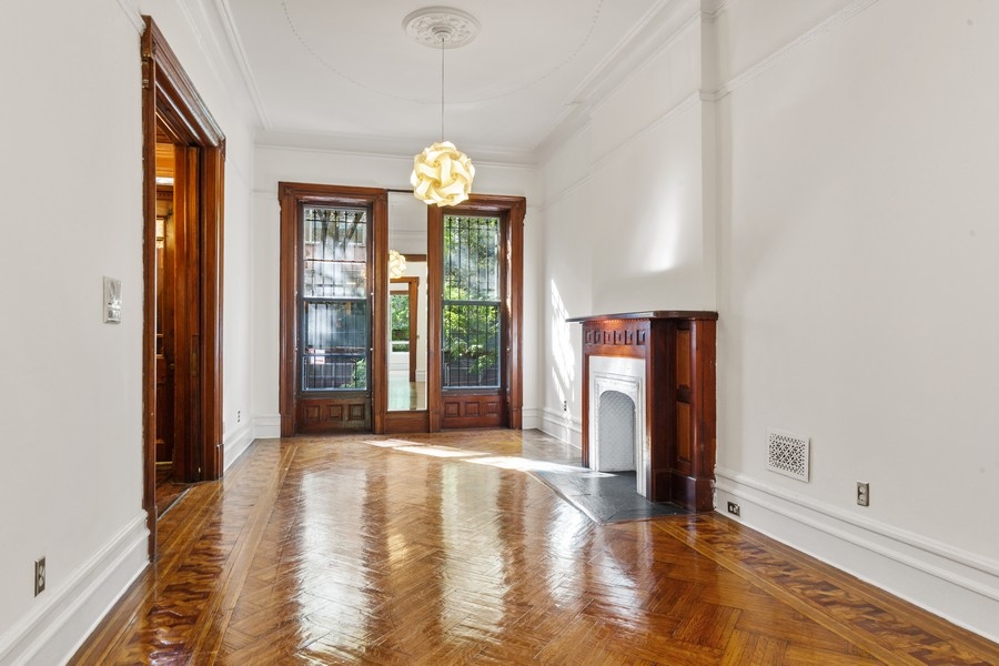 143 West 78th Street Manhattan, NY 10024 - Photo 3 of 17 a view of an entryway with wooden floor and a window
