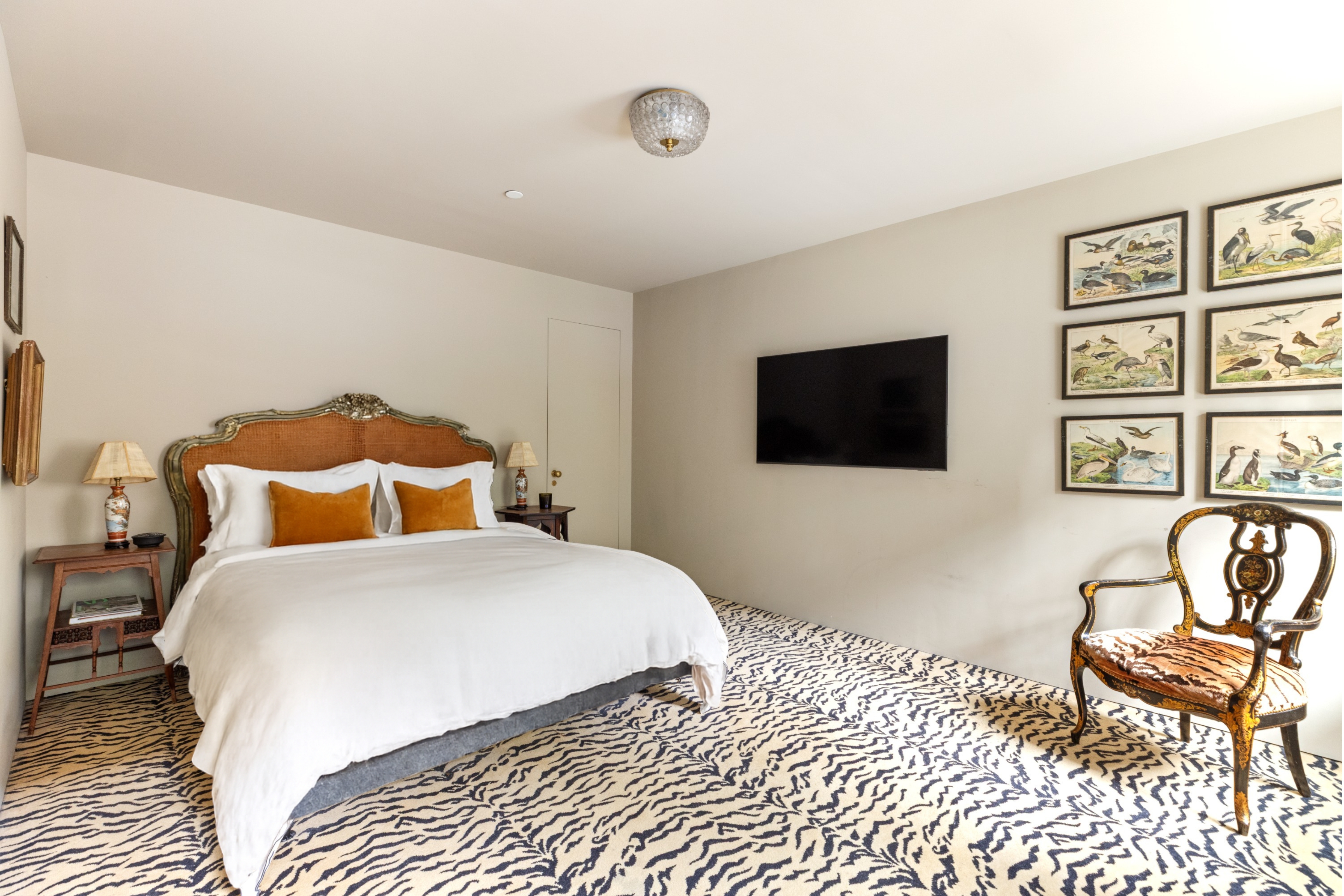 381 Union Street Brooklyn, NY 11231 - Photo 20 of 29 a bedroom with a bed a rug and chair