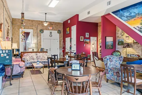 a view of a dining room with furniture