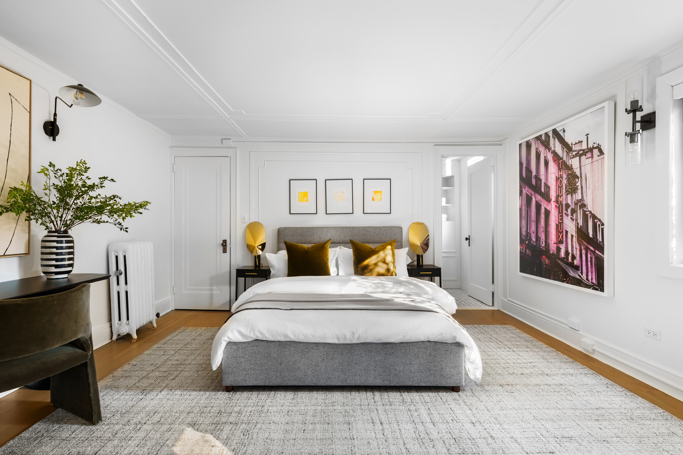 1200 Broadway, Unit PH89 Manhattan, NY 10001 - Photo 43 of 47 a spacious bedroom with a bed and a potted plant