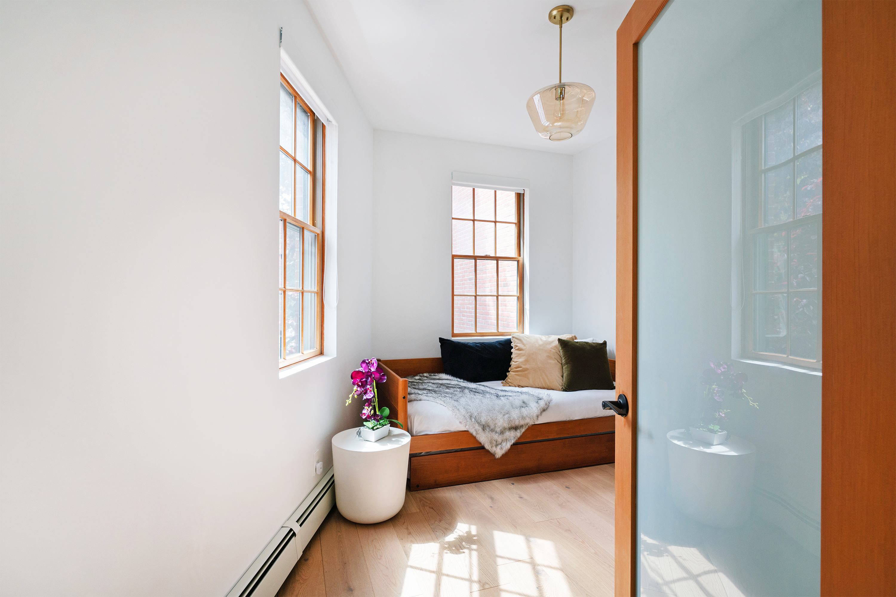 334 Plymouth Street Brooklyn, NY 11201 - Photo 16 of 32 a living room with furniture and window