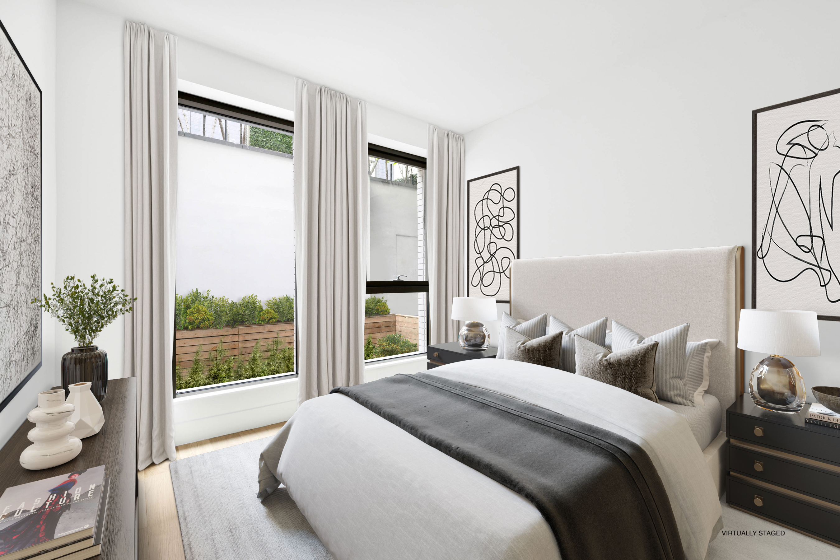 142 West 19th Street, Unit TH Manhattan, NY 10011 - Photo 6 of 10 a bedroom with a large bed and a large window