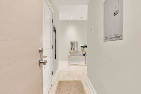 a view of a room with white walls