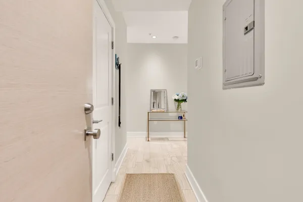 a view of a room with white walls