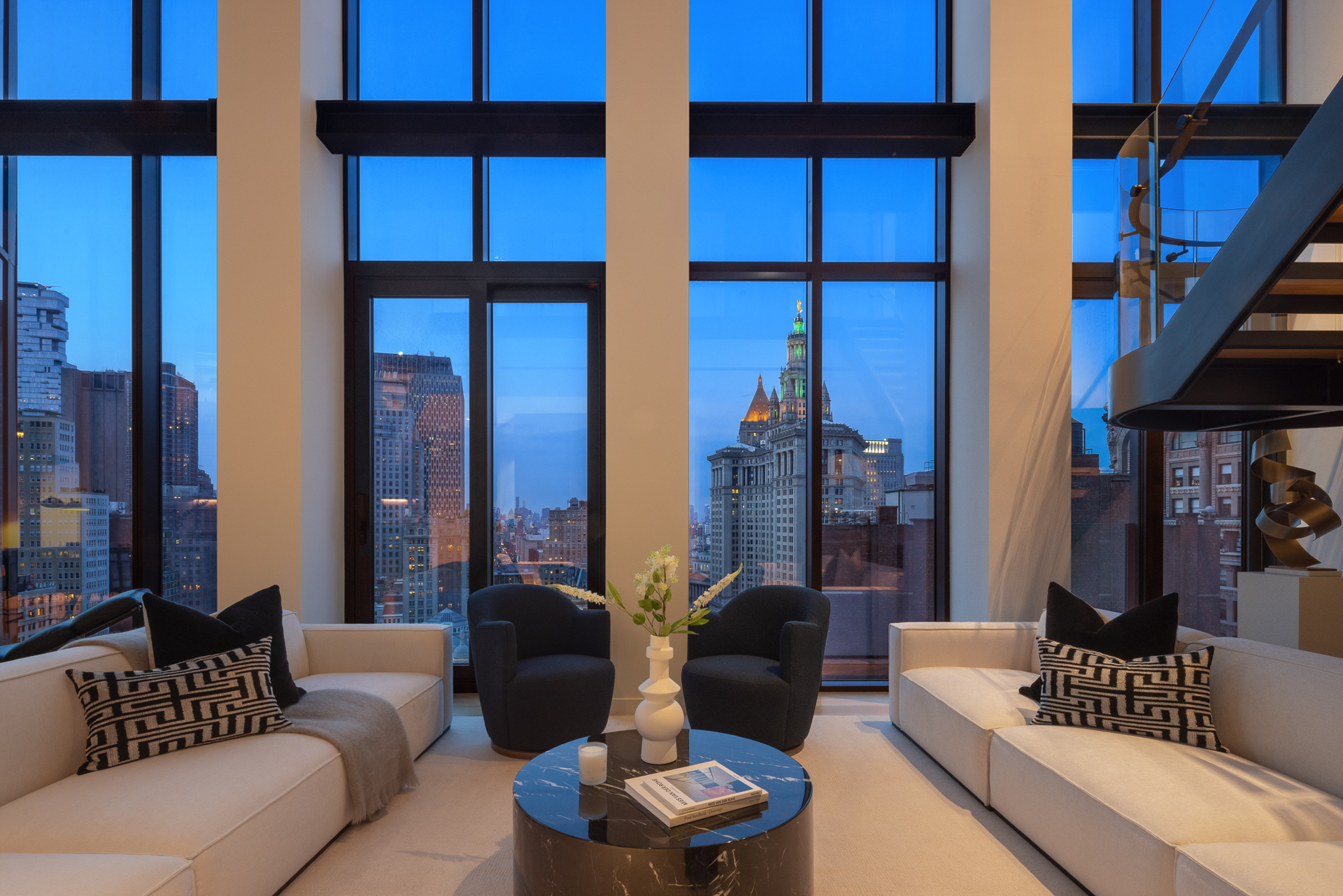 33 Park Row, Unit PH3 Manhattan, NY 10038 - Photo 23 of 30 a living room with furniture and a window