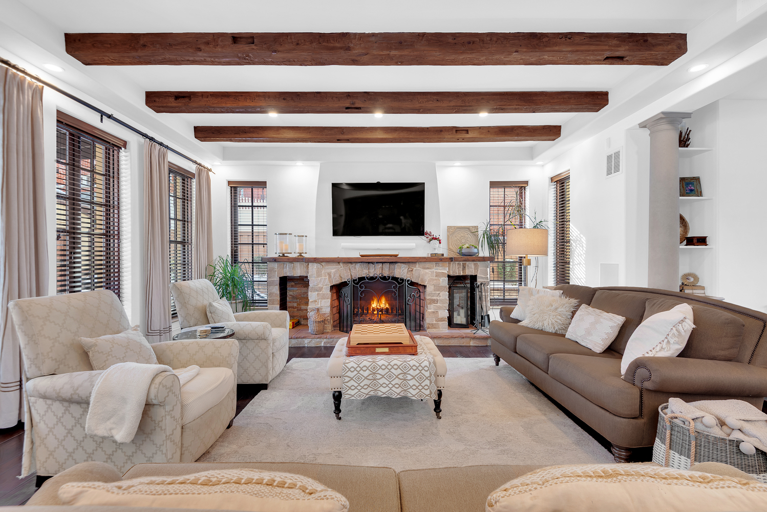 7921 Narrows Avenue Brooklyn, NY 11209 - Photo 5 of 42 a living room with furniture a fireplace and a flat screen tv
