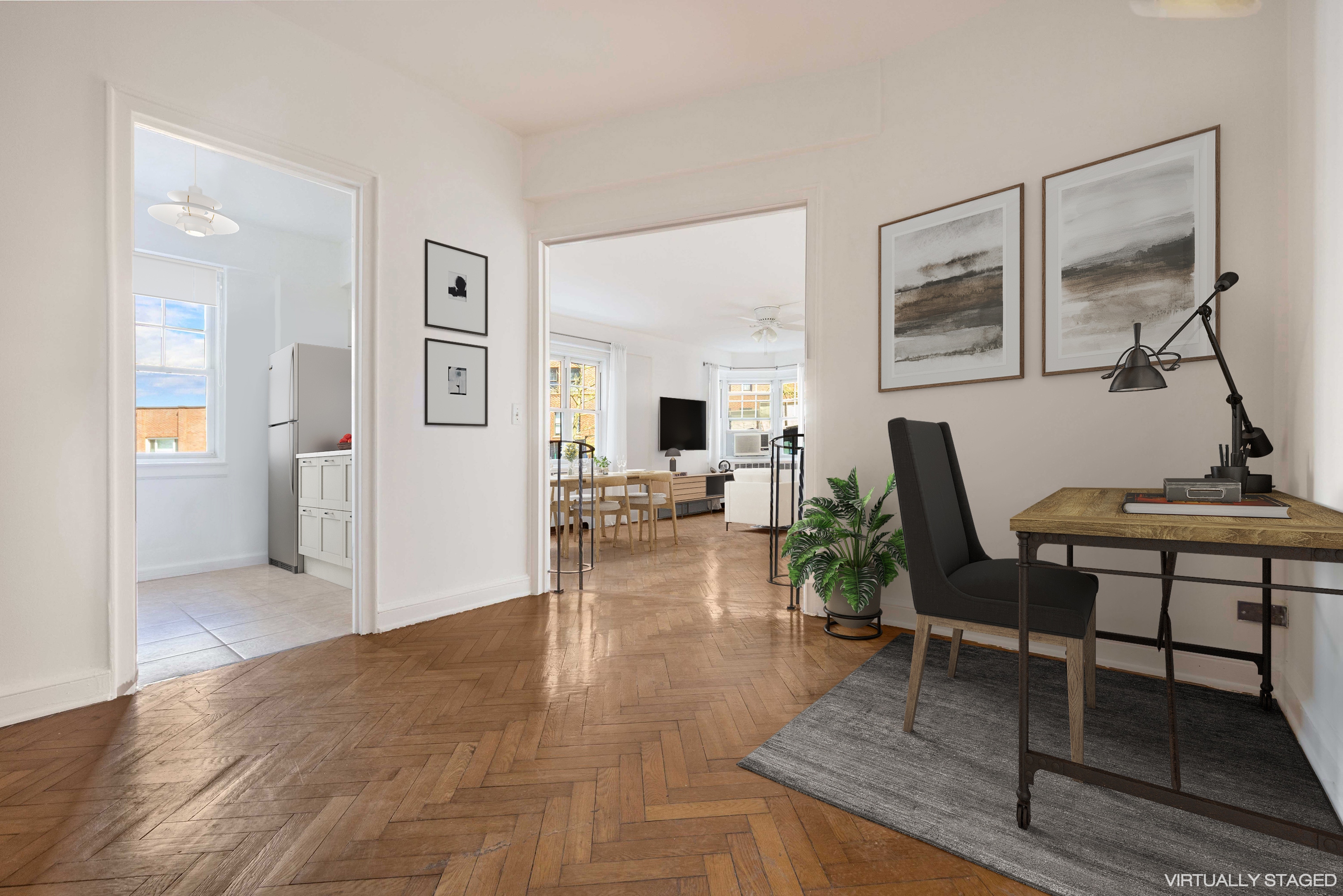 200 Cabrini Boulevard, Unit 17 Manhattan, NY 10033 - Photo 4 of 24 a living room with furniture and wooden floor