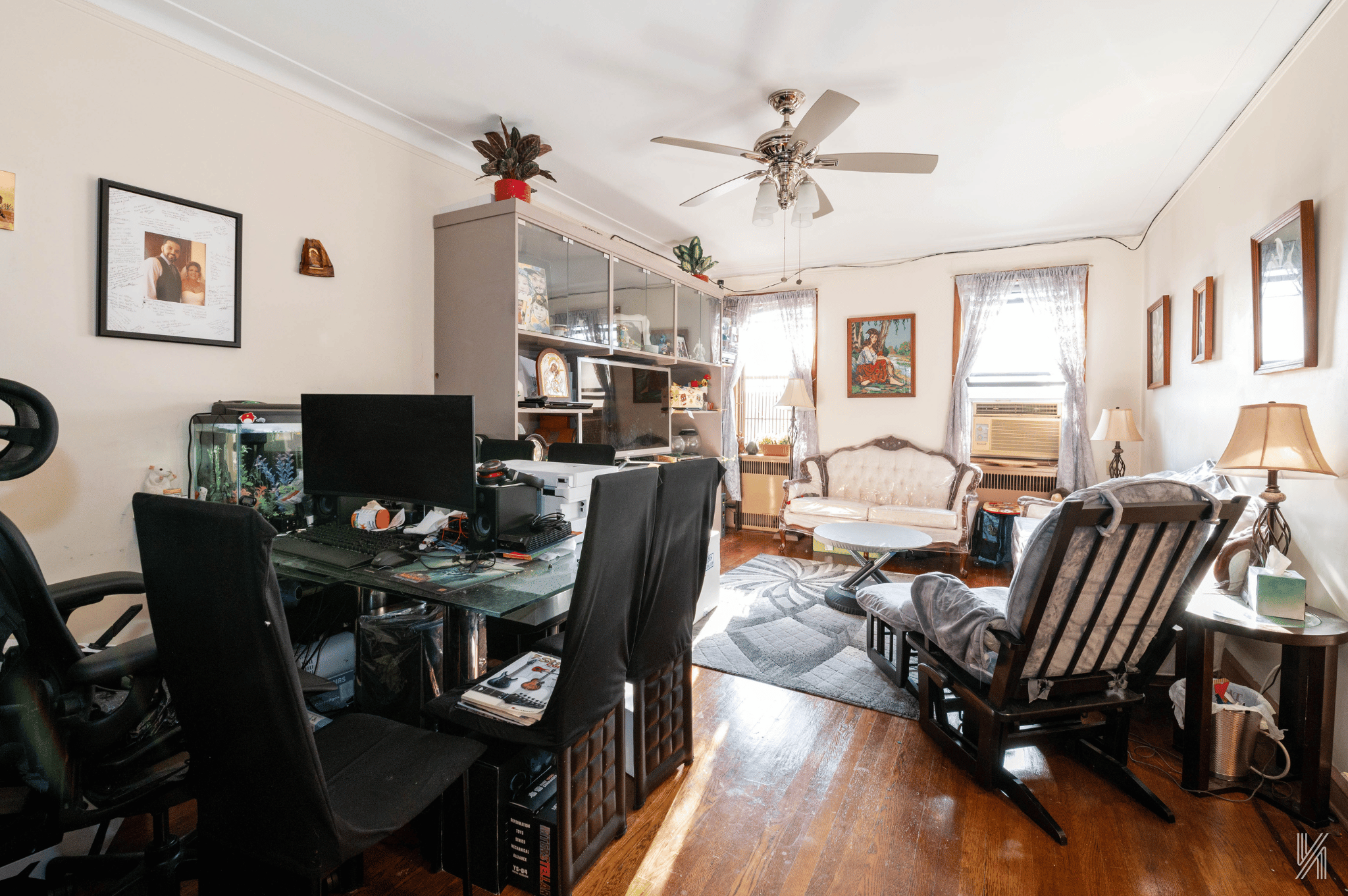 25-40 31st Avenue, Unit 6M Queens, NY 11106 - Photo 5 of 17 a view of a dining room with furniture and wooden floor