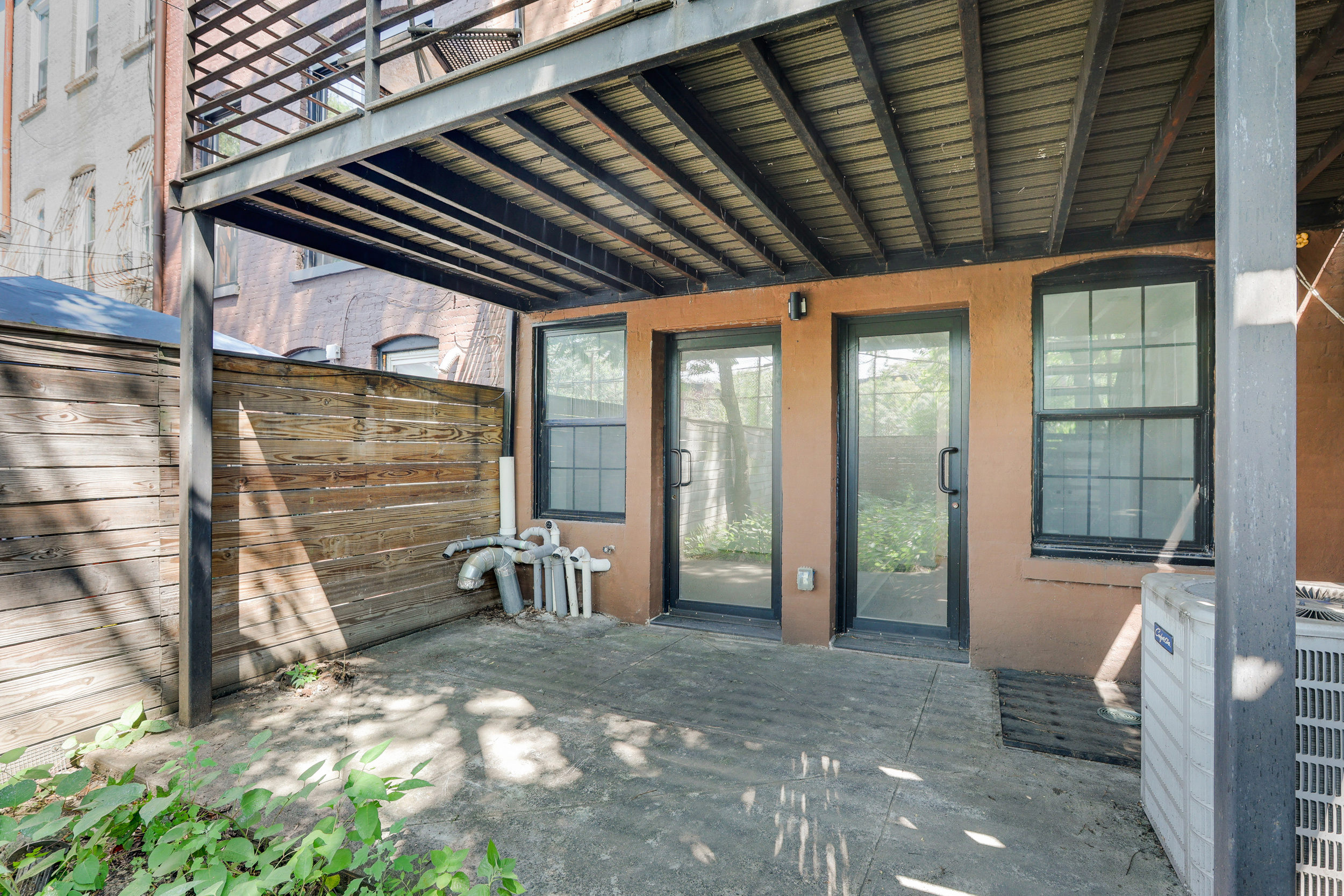 846 Hancock Street, Unit GARDEN Brooklyn, NY 11233 - Photo 2 of 17 a view of a room with gym equipment