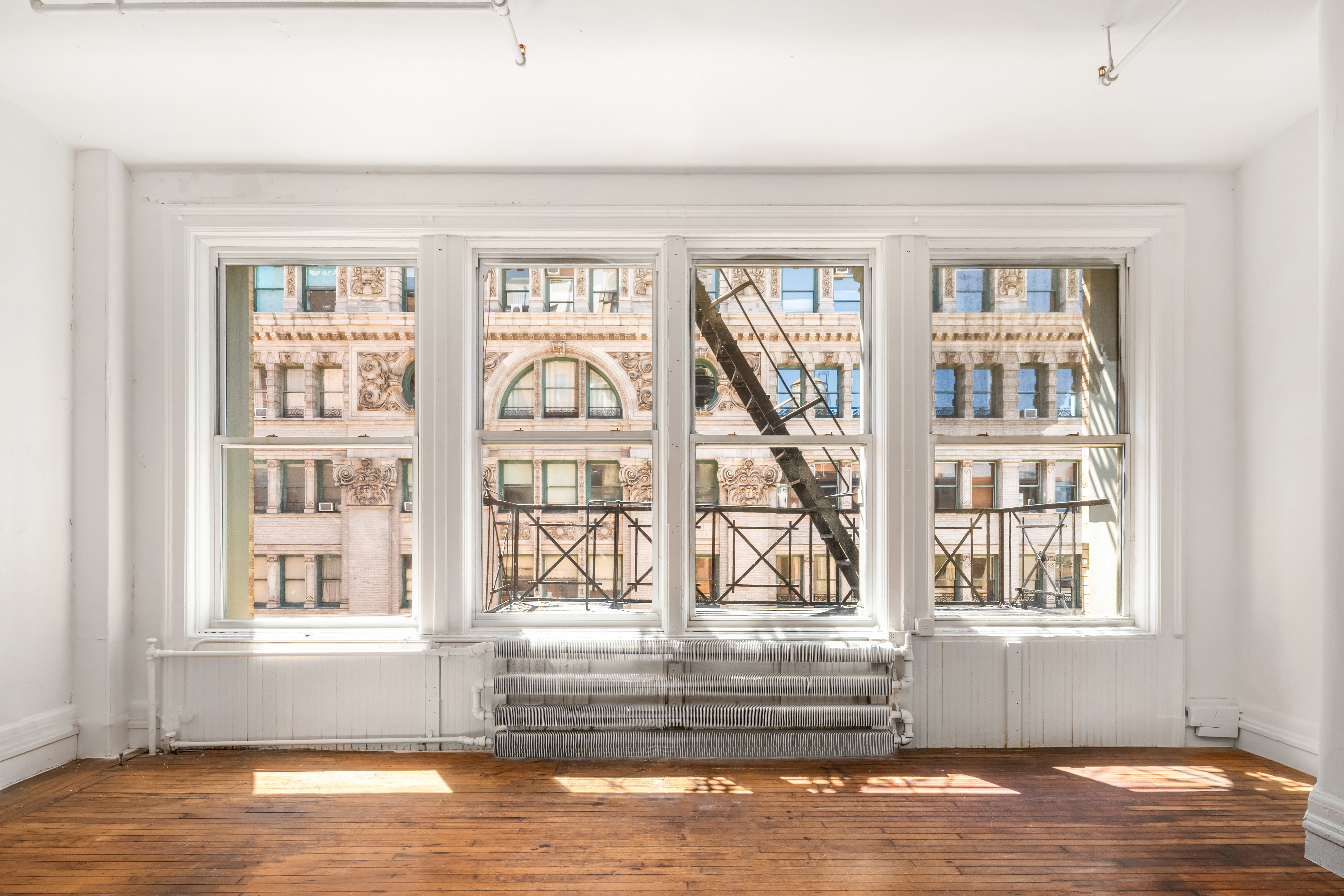 491 Broadway Manhattan, NY 10012 - Photo 8 of 11 a view of front door with furniture and a window