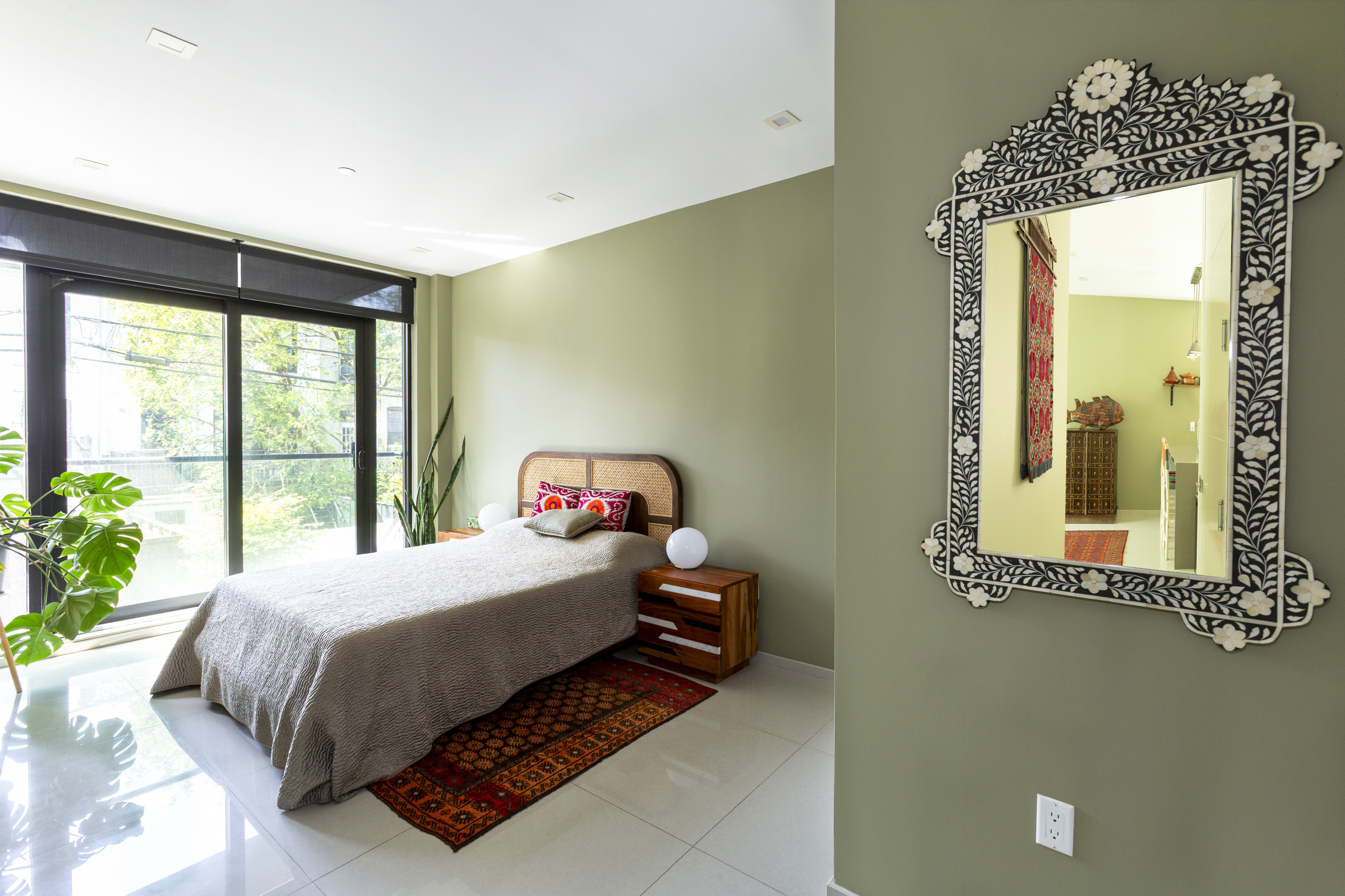 854 Putnam Avenue, Unit 2B Brooklyn, NY 11221 - Photo 6 of 12 a bedroom with a bed and window