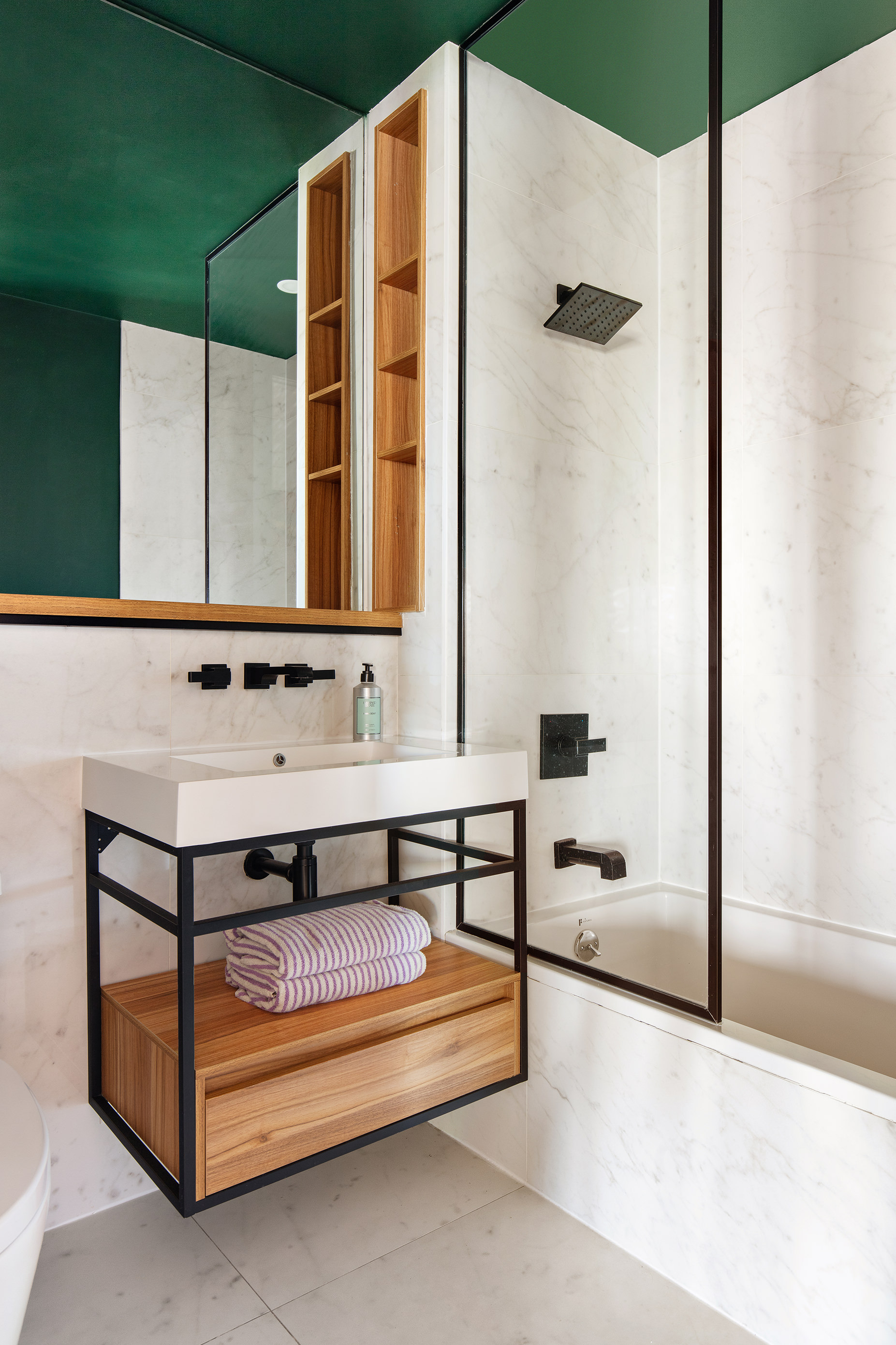 707 Willoughby Avenue, Unit 6B Brooklyn, NY 11206 - Photo 10 of 17 a bathroom with a bathtub and a shower