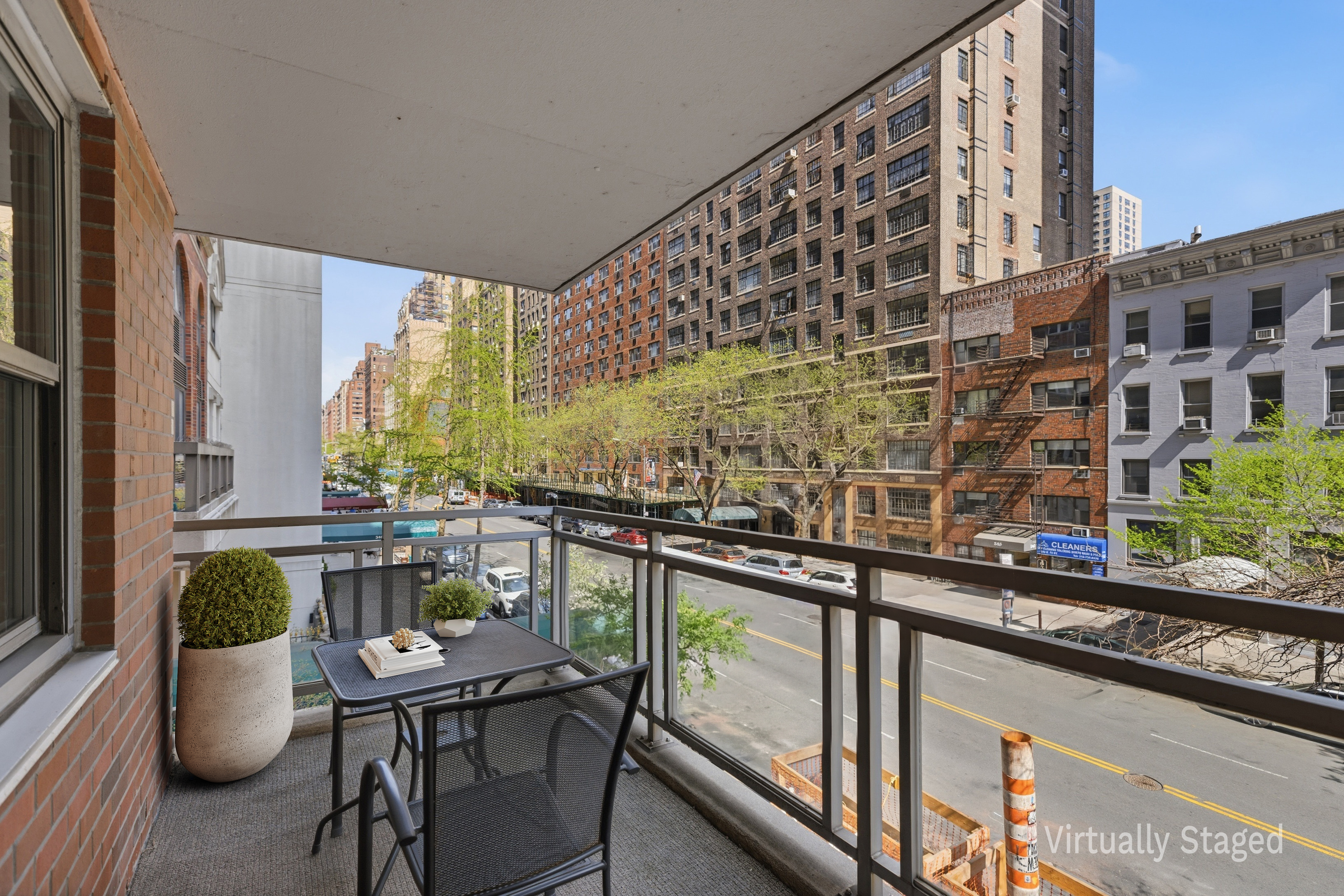 360 East 72nd Street, Unit A306 Manhattan, NY 10021 - Photo 6 of 17 a kitchen with a table chairs and wooden floor