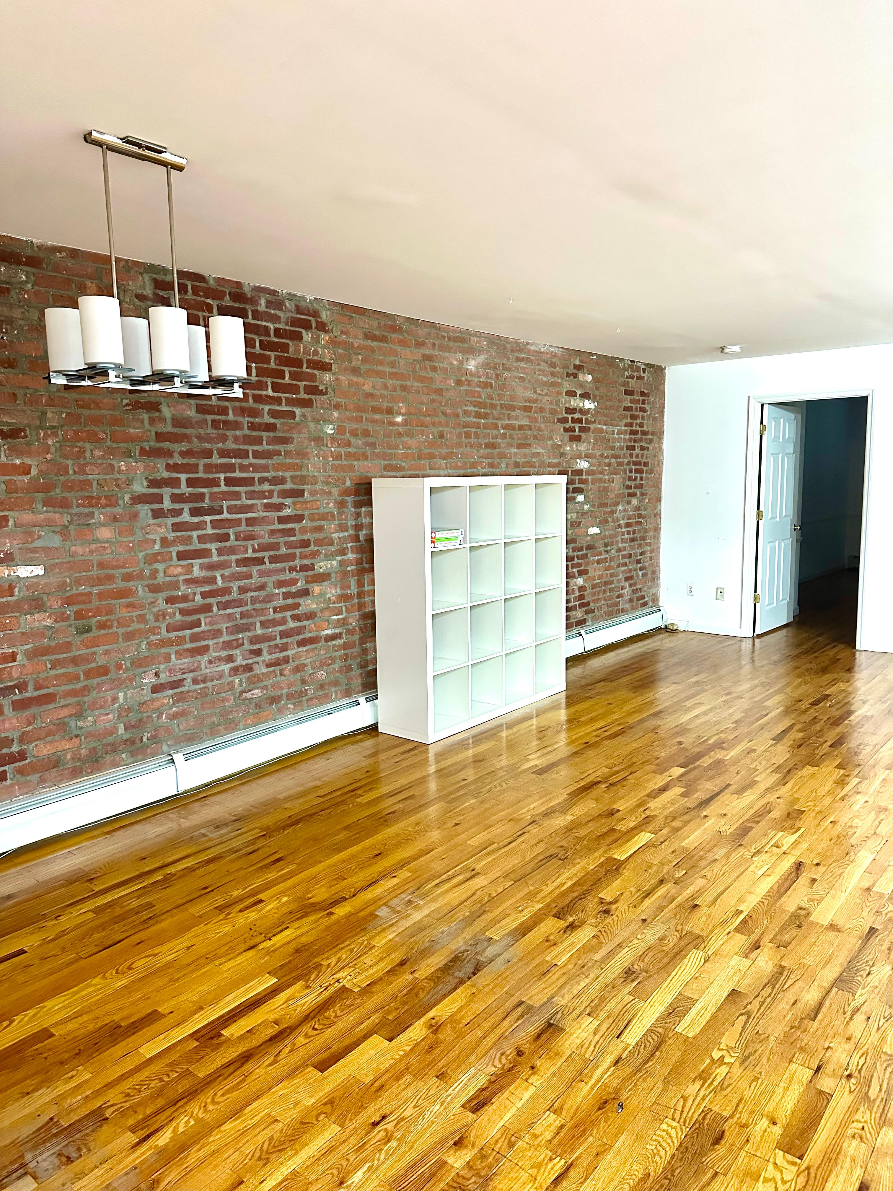 710 St Nicholas Avenue, Unit 1 Manhattan, NY 10032 - Photo 7 of 15 a view of a swimming pool and an empty room