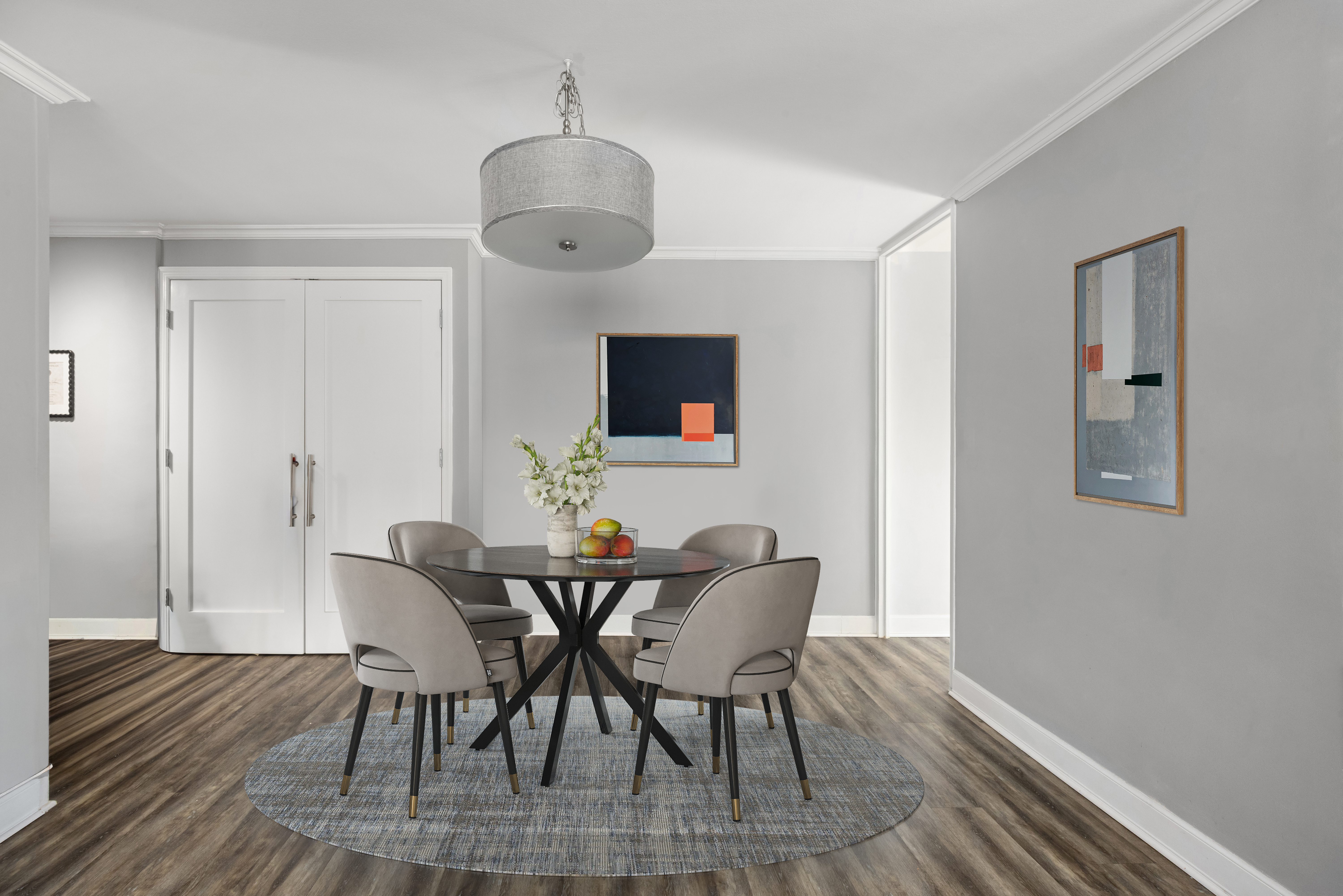 201 East 37th Street, Unit 11B Manhattan, NY 10016 - Photo 3 of 6 a view of a dining room with furniture and wooden floor