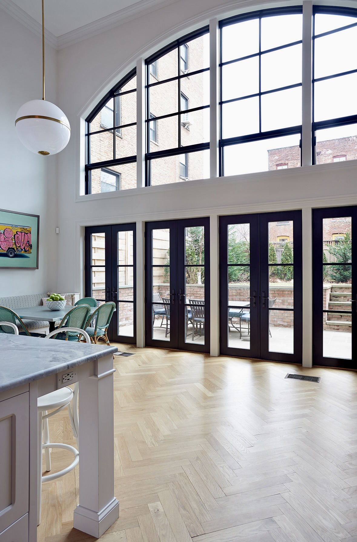 435 Clinton Avenue Brooklyn, NY 11238 - Photo 5 of 27 a hall with a large window and flat screen tv