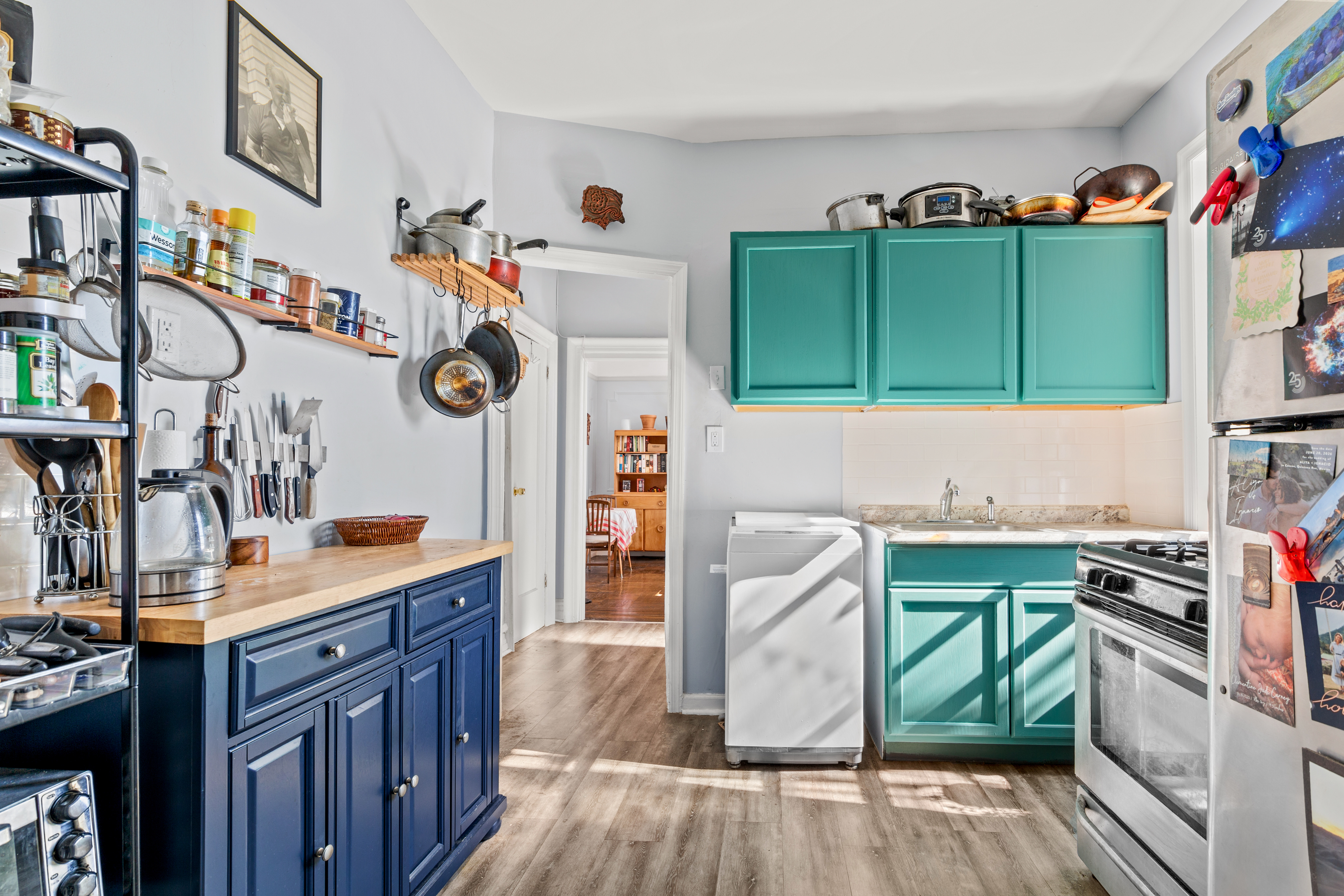 374 South 2nd Street, Unit 33 Brooklyn, NY 11211 - Photo 5 of 8 a kitchen with a sink cabinets and wooden floor