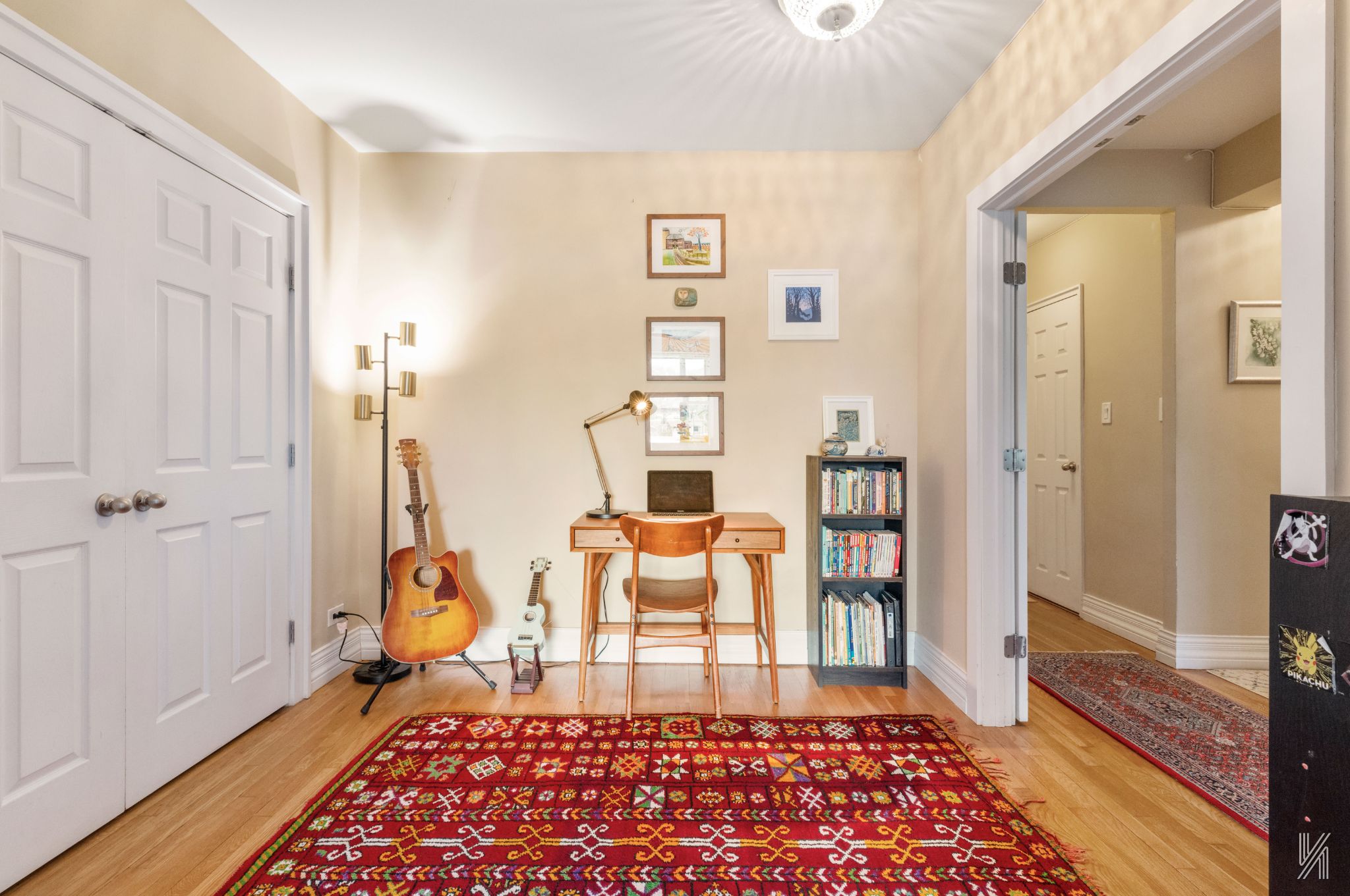 34-41 85th Street, Unit 4P Queens, NY 11372 - Photo 7 of 20 a bedroom with furniture and a rug