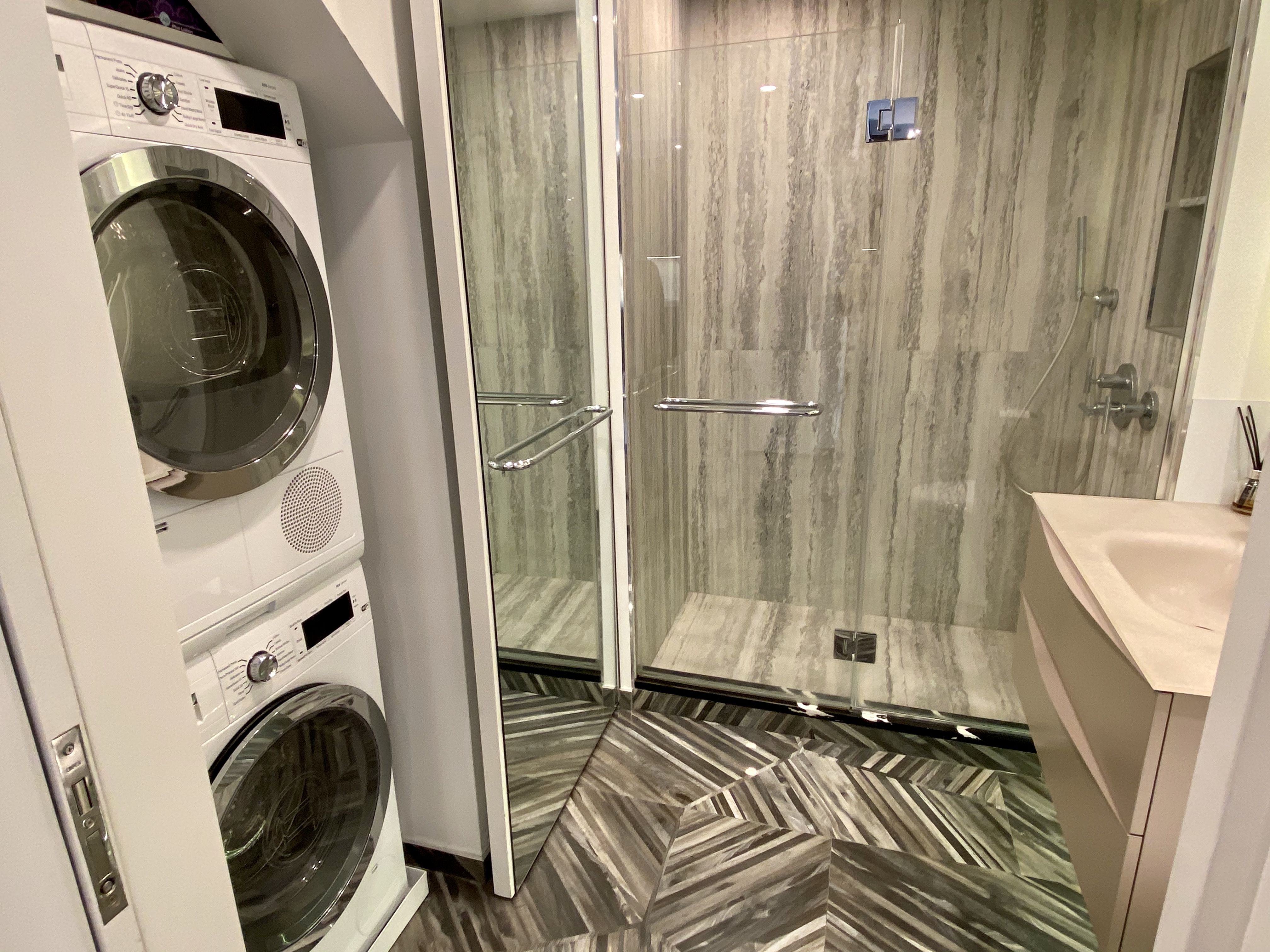 350 West 53rd Street, Unit PHB Manhattan, NY 10019 - Photo 18 of 34 a view of a utility room with washer and dryer