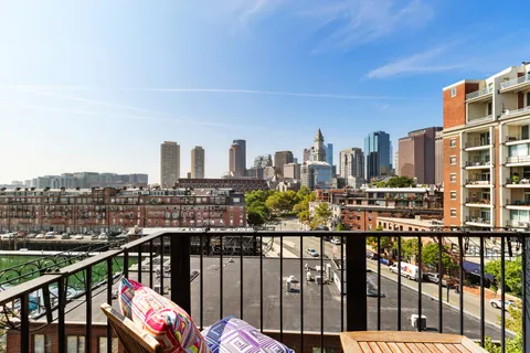 a view of city from a balcony