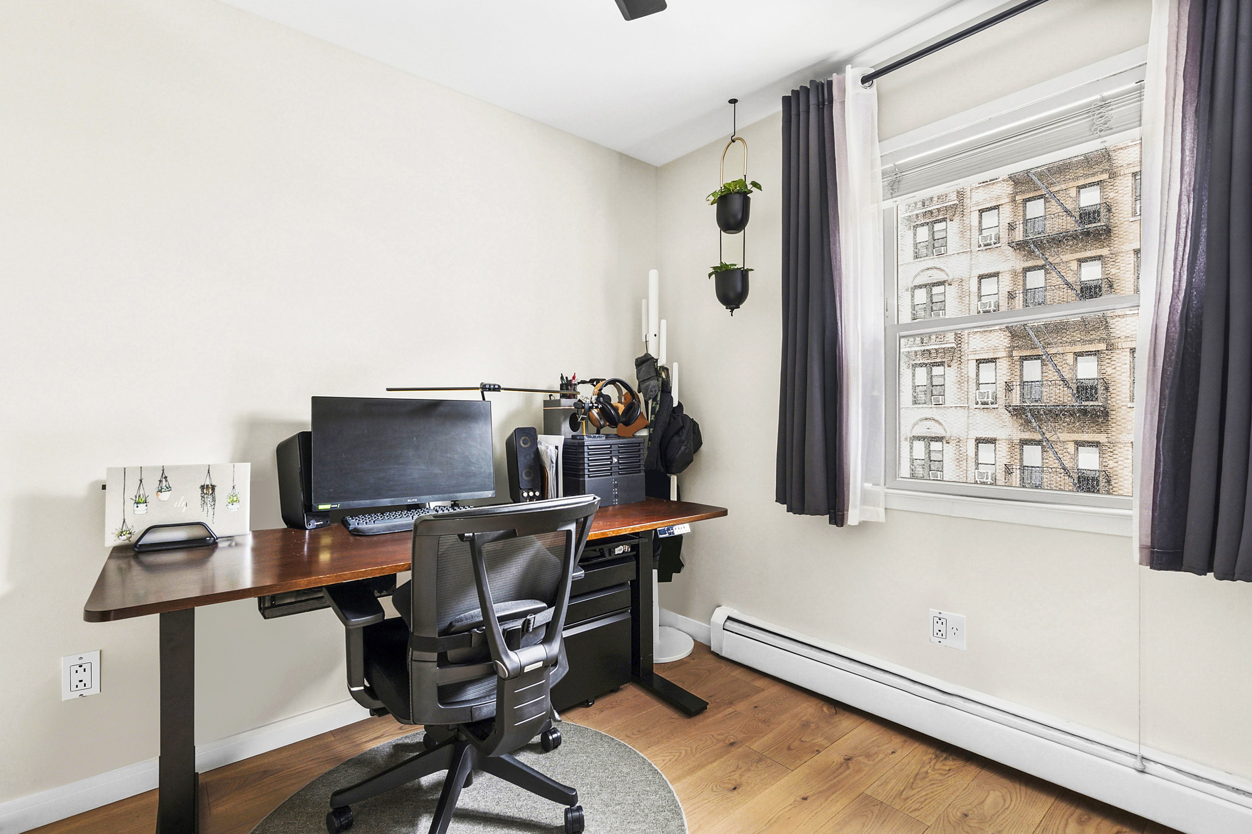 143 Bay Ridge Parkway, Unit 3 Brooklyn, NY 11209 - Photo 11 of 12 a view of a workspace with furniture and a window