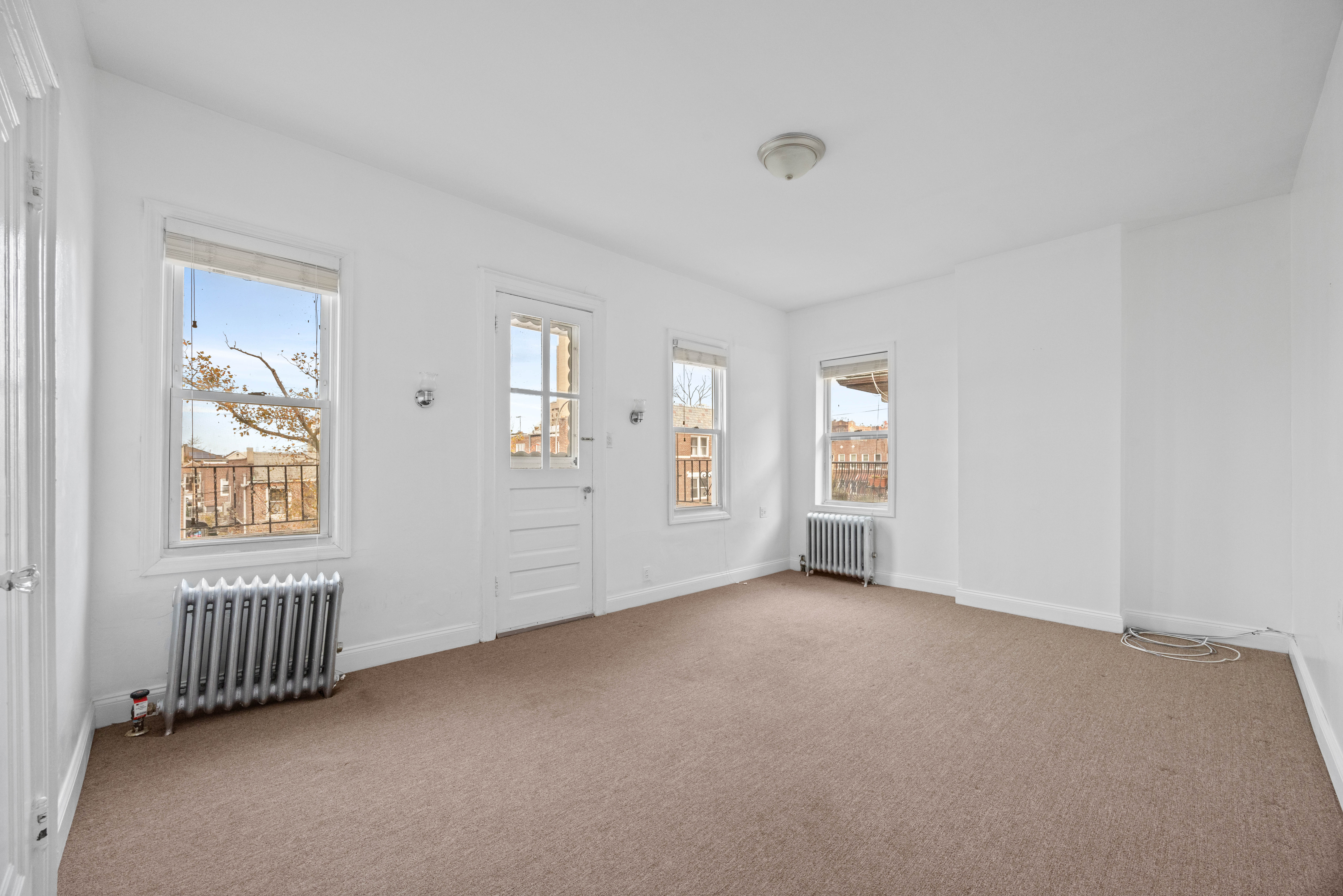 3712 Oceanic Avenue, Unit 2 Brooklyn, NY 11224 - Photo 4 of 14 a view of an empty room with a window